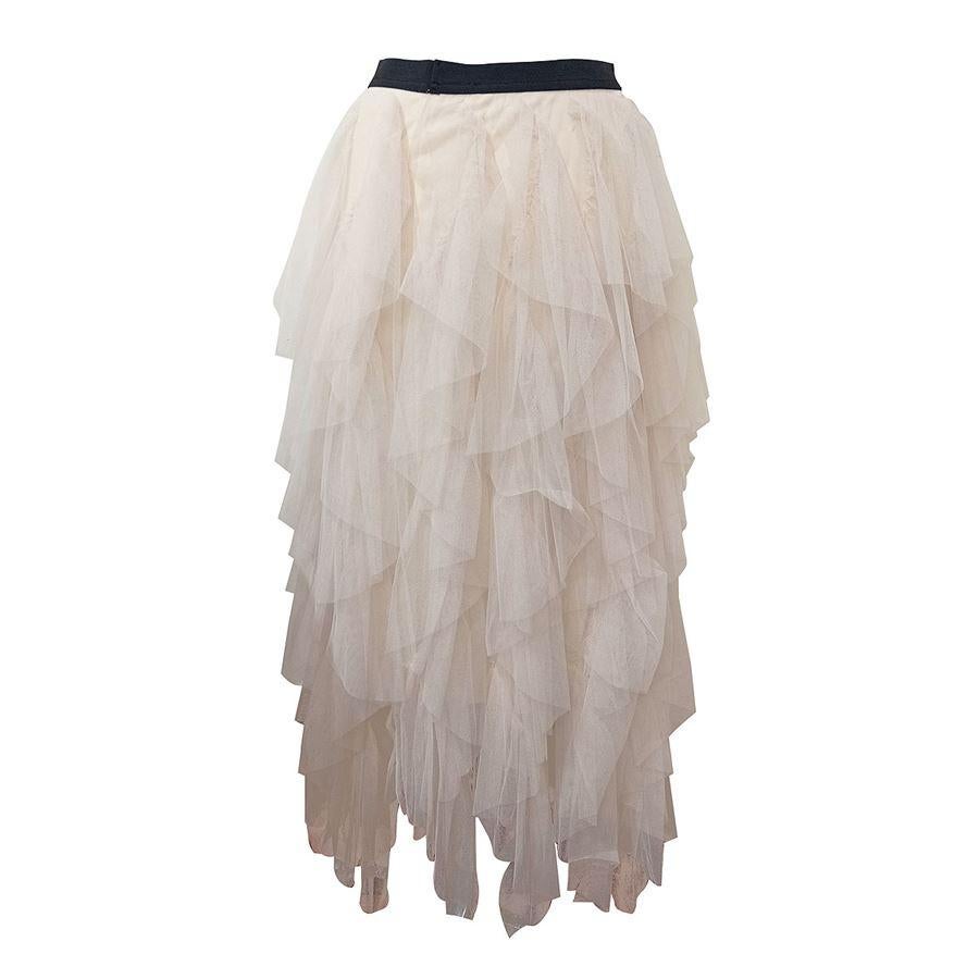 Polyester Tulle Ivory color Flounced Elastic waist Total length cm 88 (34,64 inches) Waist cm 32 (12,59 inches) extensible
