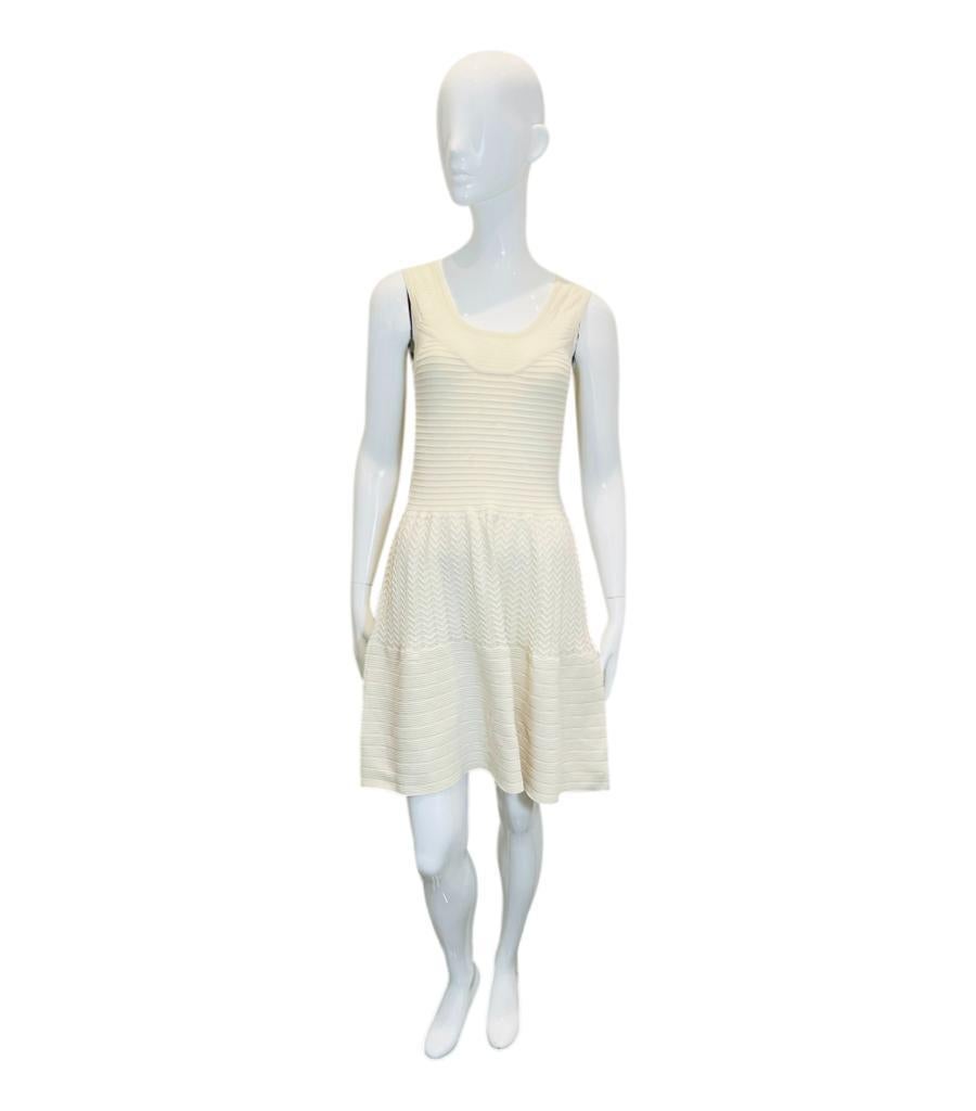 Sandro Fit & Flare Cotton Dress
Ivory sleeveless dress designed with round neckline and structured design.
Featuring fitted bodice and flared skirt.
Size – 2 - M
Condition – Very Good
Composition – 88% Cotton, 10% Nylon, 2% Elastane
