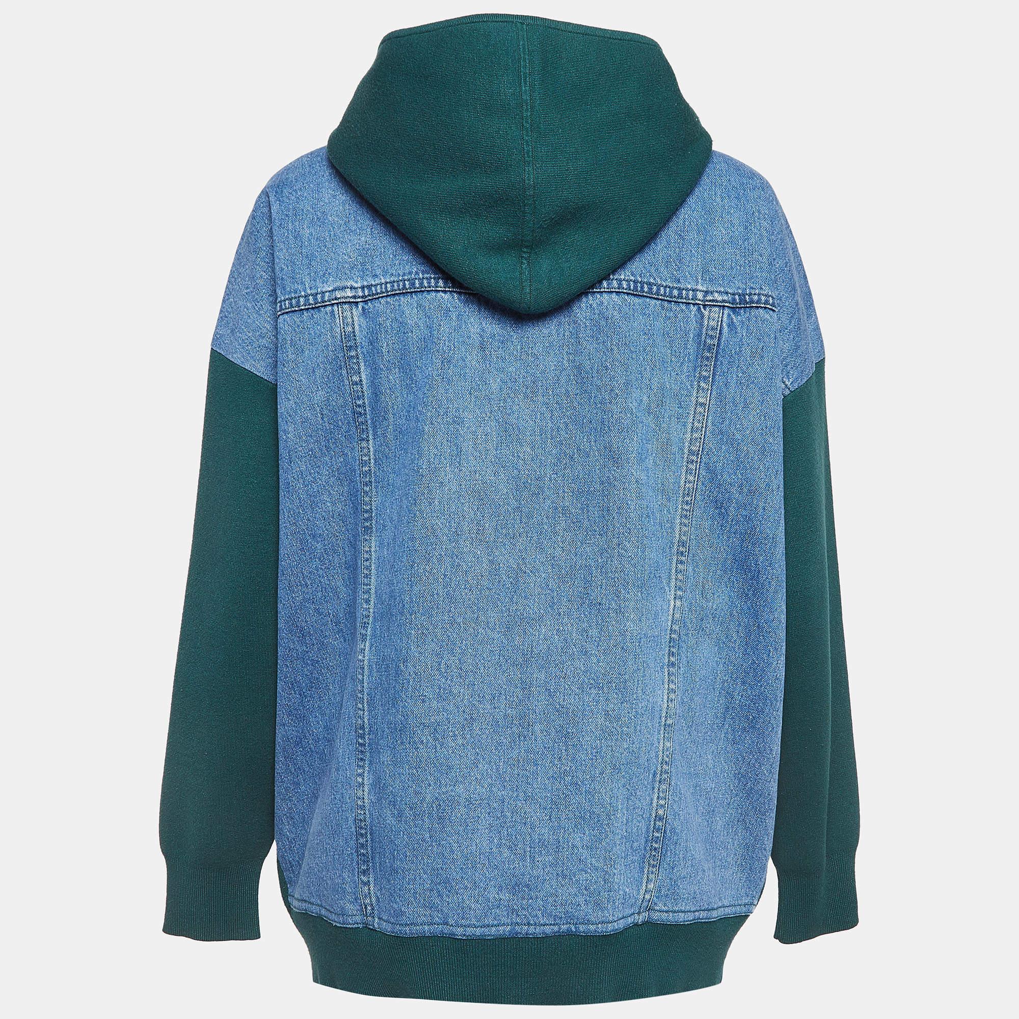 Introducing the Sandro hoodie - a fusion of comfort and style. Crafted with precision this hoodie boasts a cozy knit fabric blended seamlessly with denim accents. Its oversized silhouette exudes effortless coolness while the rich green hue adds a