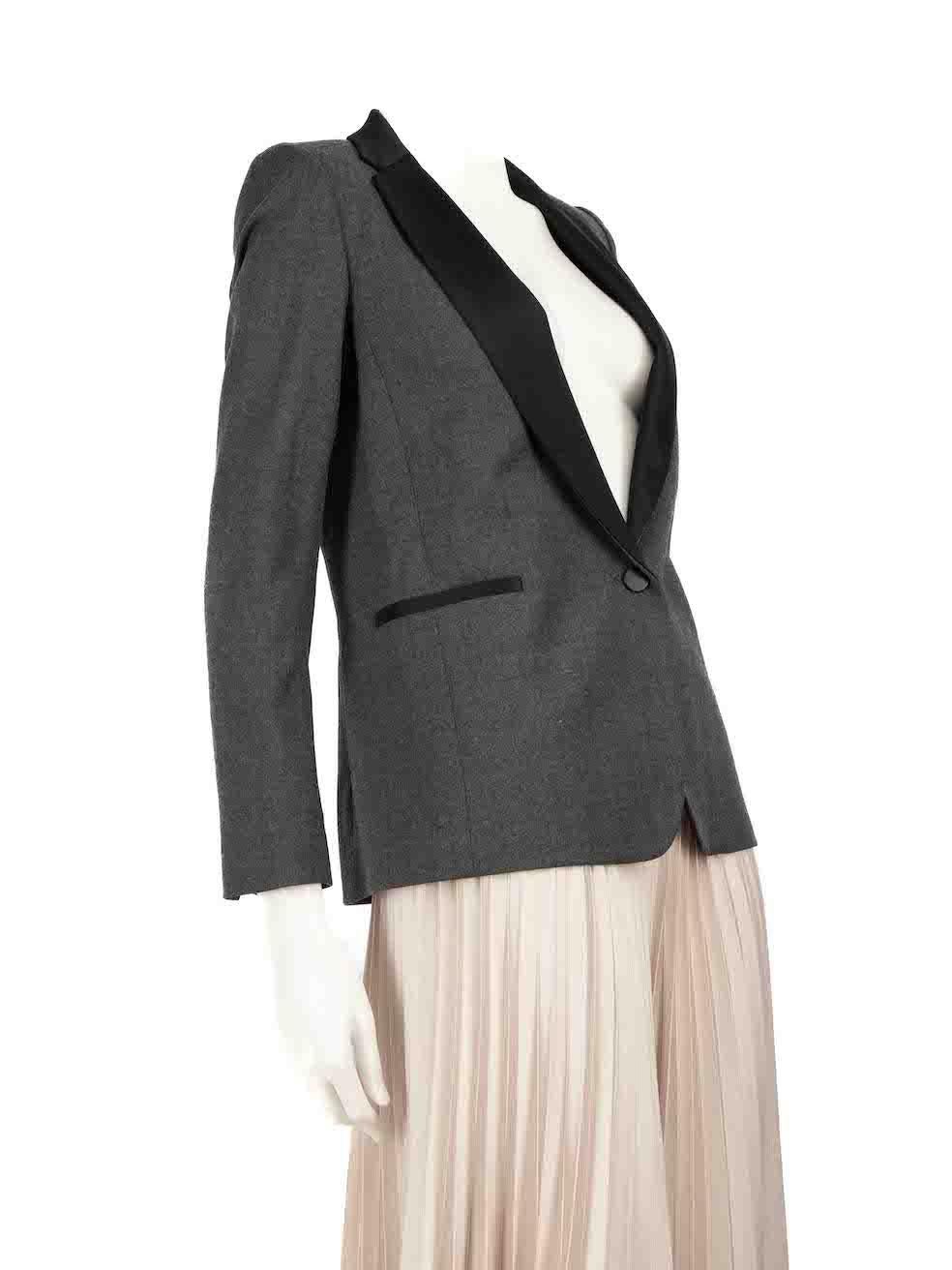 CONDITION is Very good. Hardly any visible wear to the blazer is evident on this used Sandro designer resale item.
 
 
 
 Details
 
 
 Grey
 
 Wool
 
 Blazer
 
 Contrast black lapel
 
 Shoulder pads
 
 Button up fastening
 
 Single breasted
 
 Long