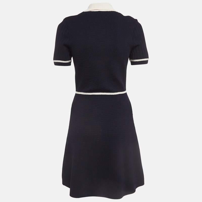 This Sandro dress is a chic and stylish garment that exudes elegance and sophistication. With its sleek design flattering silhouette and high quality craftsmanship this dress is perfect for any special occasion or evening event ensuring you stand