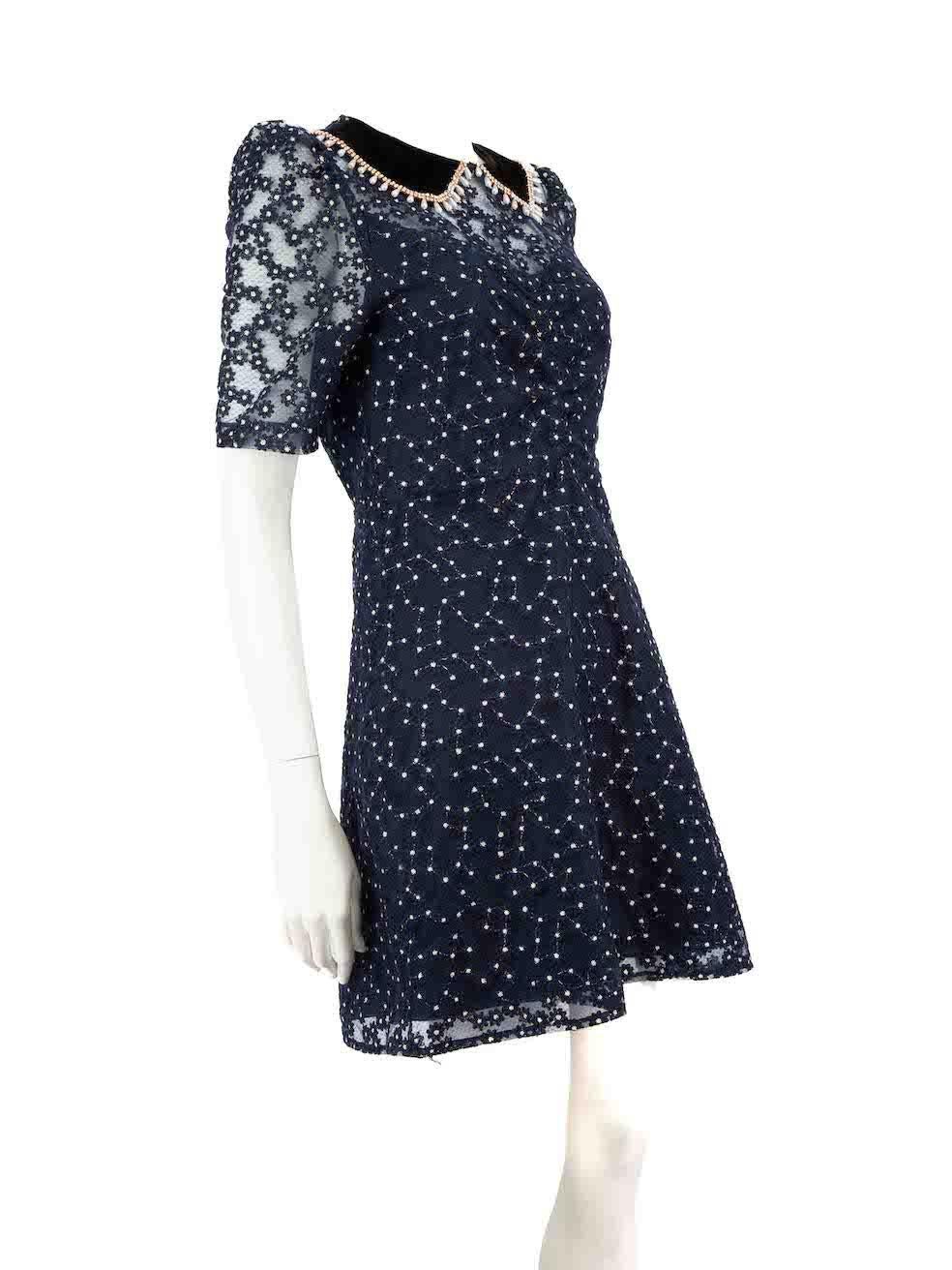 CONDITION is Very good. Hardly any visible wear to dress is evident on this used Sandro designer resale item.
 
 Details
 Navy
 Polyester
 Knee length dress
 Floral embroidered accent
 Crystal detail collar
 Round neckline
 Sheer short sleeves
 Back