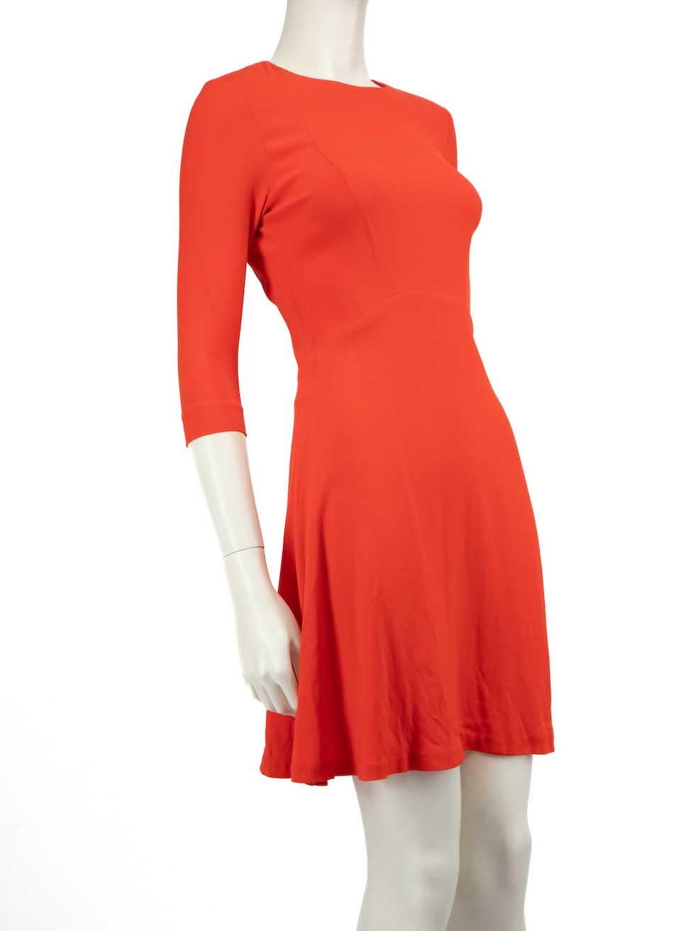 CONDITION is Very good. Minimal wear to dress is evident. Small pilling to the shoulders, bottom left sleeve and front waistline on this used Sandro designer resale item.
 Details
 Orange
 Viscose
 Dress
 Open back
 Mini
 Mid sleeves
 Round neck
