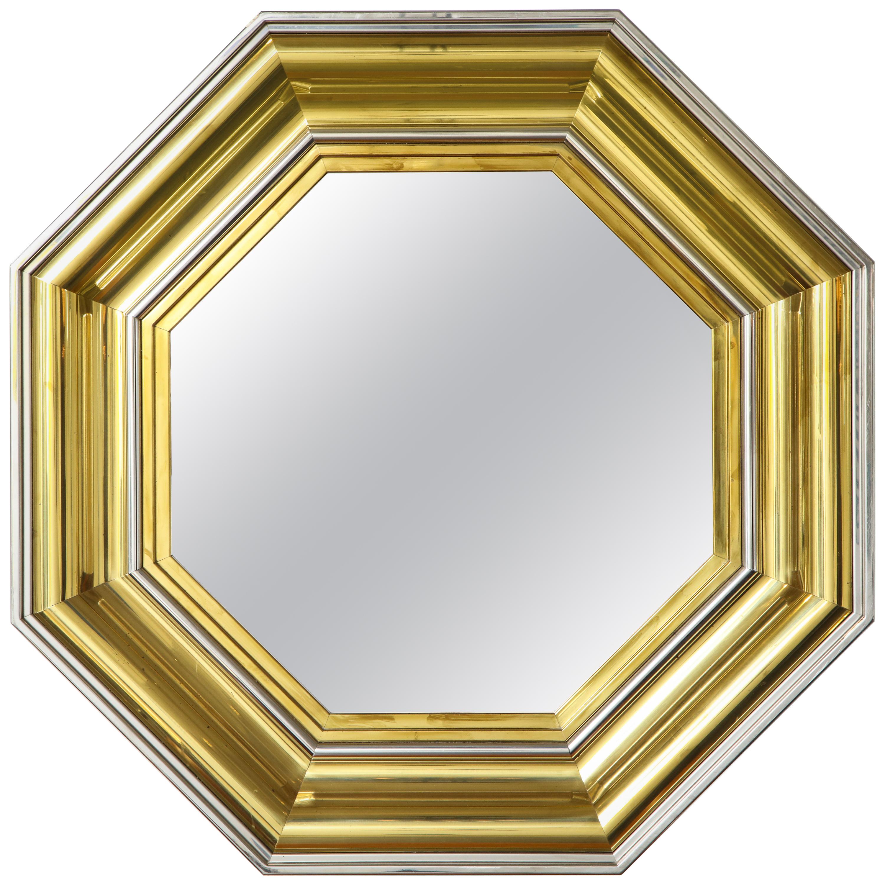 Designed by Sandro Petti for Maison Jansen rare pair of grand scale octagonal brass and chrome mirrors, Production Metallarte, Italy, 1970s. Iconic of the 1970s in their bold grand size and choice of materials, these incredibly striking and chic