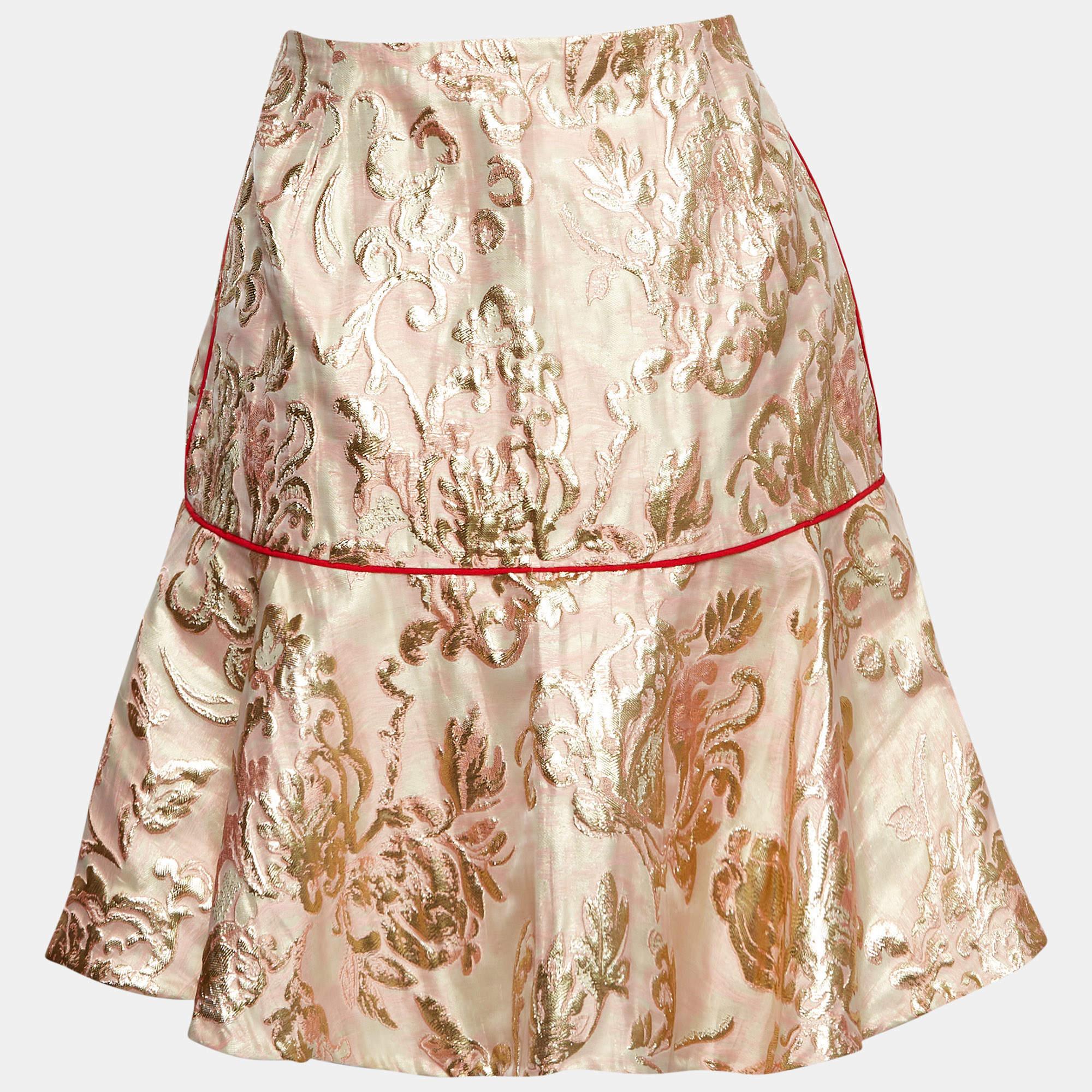 This elegant skirt is worth adding to your closet Crafted from fine materials it is exquisitely designed into a flattering shape.