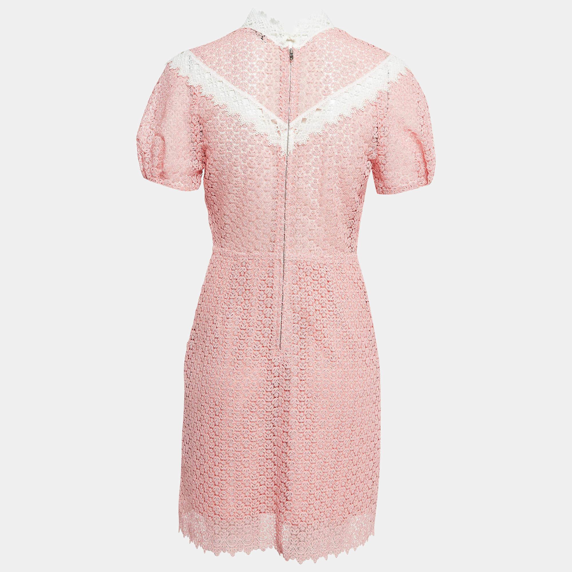 This designer dress is a chic and stylish garment that exudes elegance and sophistication. With its sleek design flattering silhouette and high quality craftsmanship this dress is perfect for any special occasion or evening event ensuring you stand