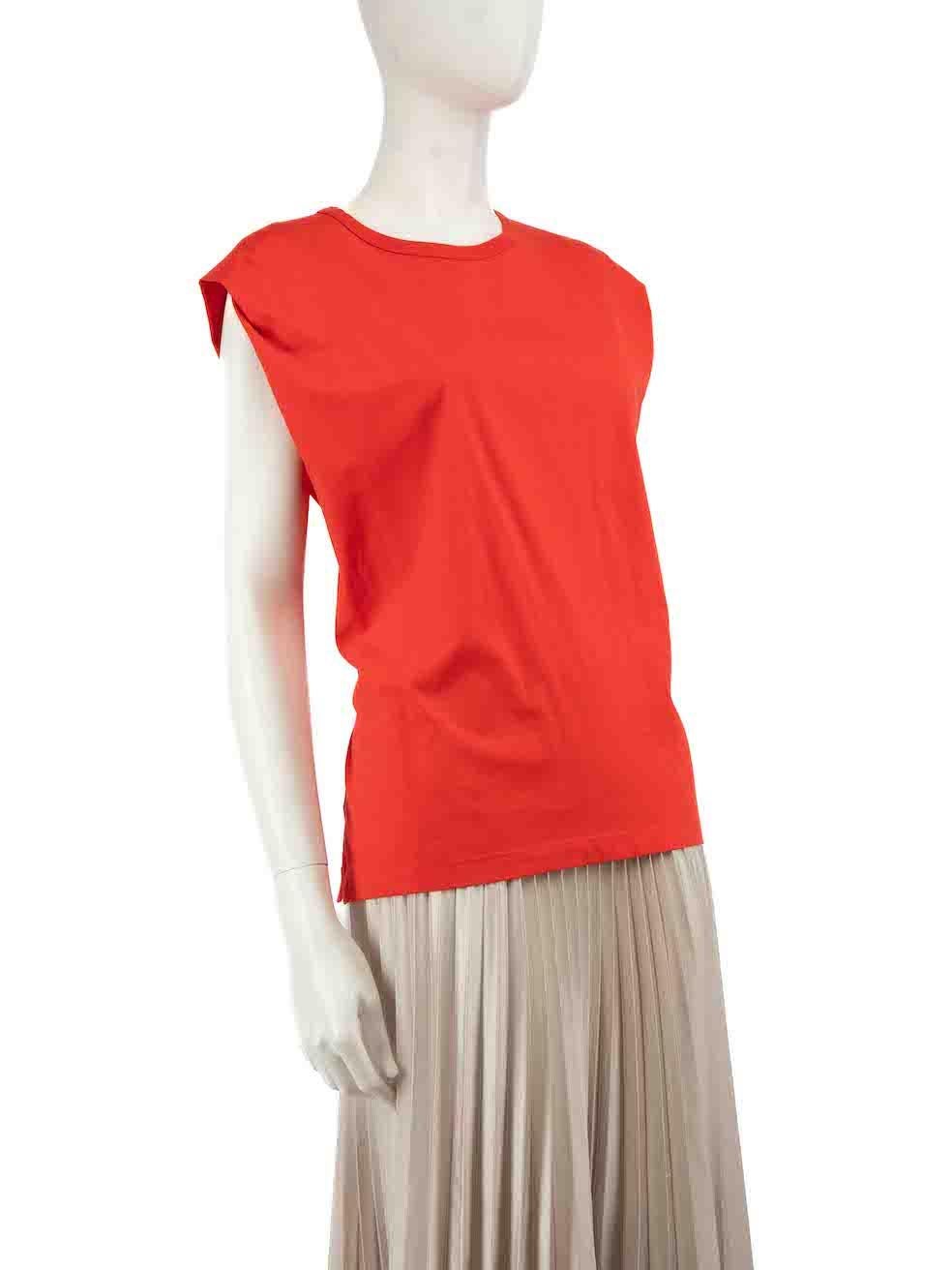 CONDITION is Very good. Minimal wear to top is evident. There are small marks to the fabric at the front of the t-shirt on this used Sandro designer resale item.
 
 Details
 Red
 Cotton
 Top
 Sleeveless
 Round neck
 Waist tie
 
 
 Made in Portugal
