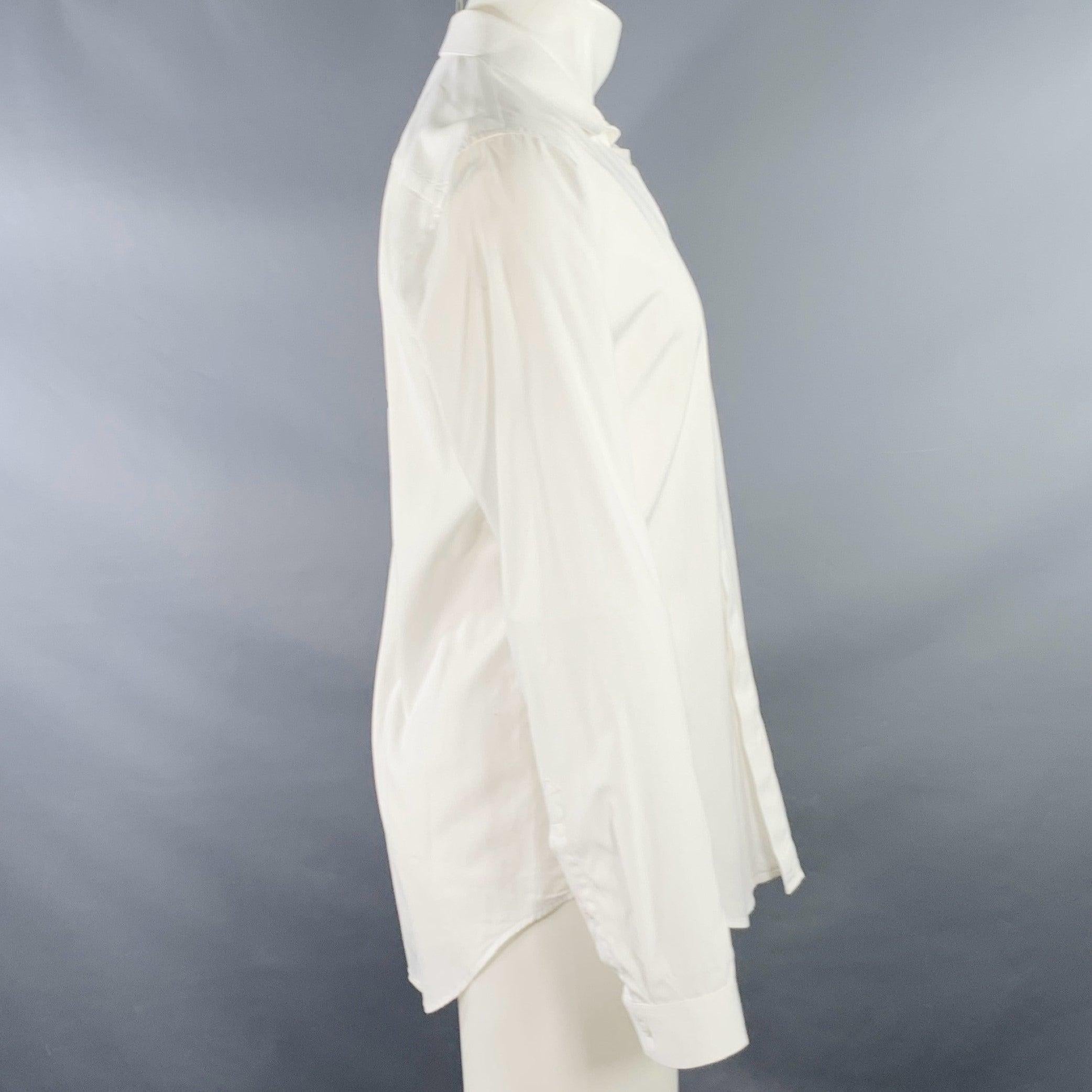 SANDRO long sleeve shirt
in a white cotton woven fabric featuring a curved cutaway collar, and hidden button closure. Excellent Pre-Owned Condition. 

Marked:   41 

Measurements: 
 
Shoulder: 17.5 inches Chest: 42 inches Sleeve: 25.5 inches Length: