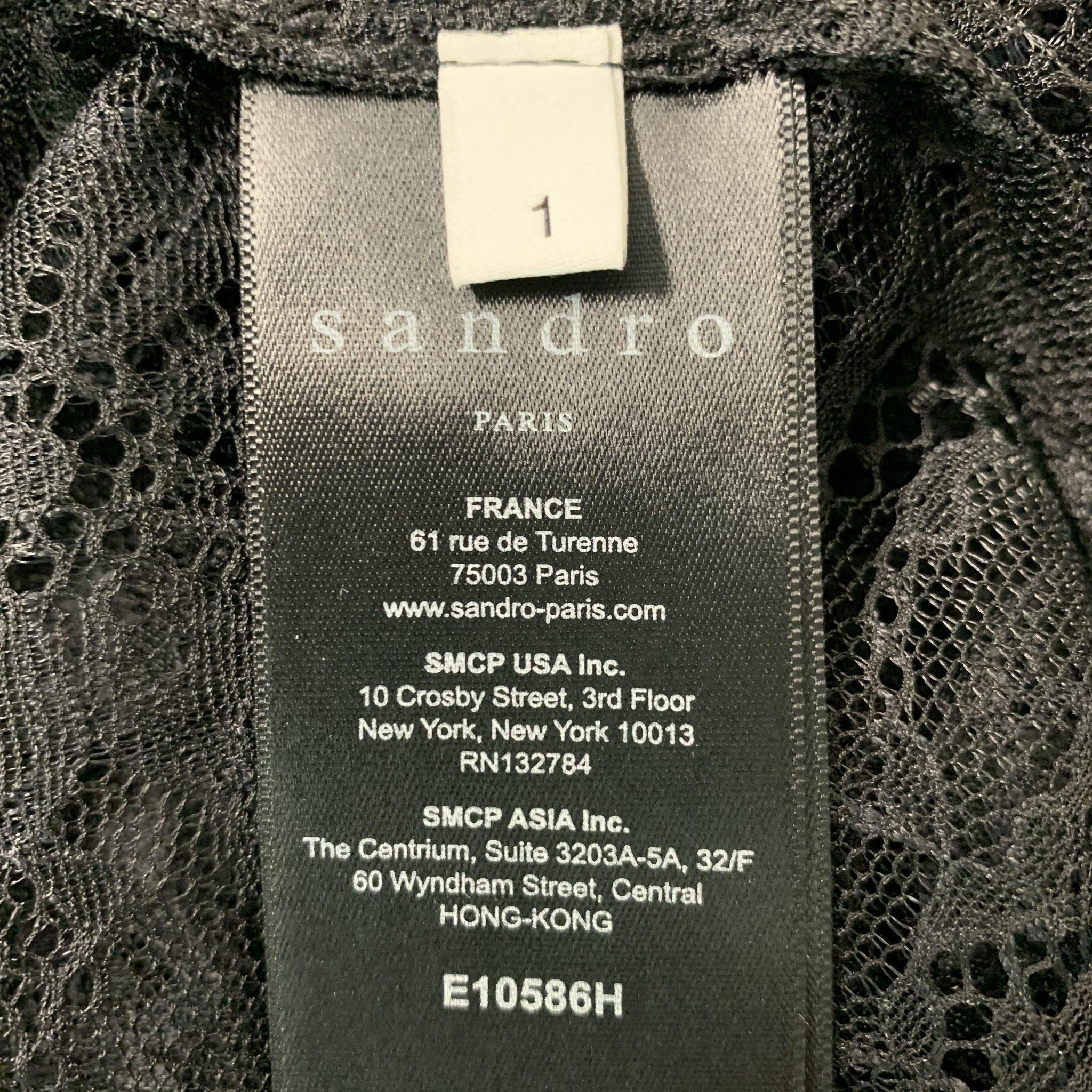 SANDRO - Haut à manches longues en dentelle polyamide noire, taille S en vente 1