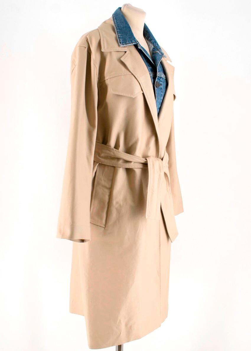 Sandro beige long trench classic coat featuring a denim detachable application, multi pockets and a detachable waist tie. 

Composition:
- Main Fabric: 100% cotton
- Buttons: 100% brass
- Bias binding: 100% polyester
- Back lining: 100% polyester
-