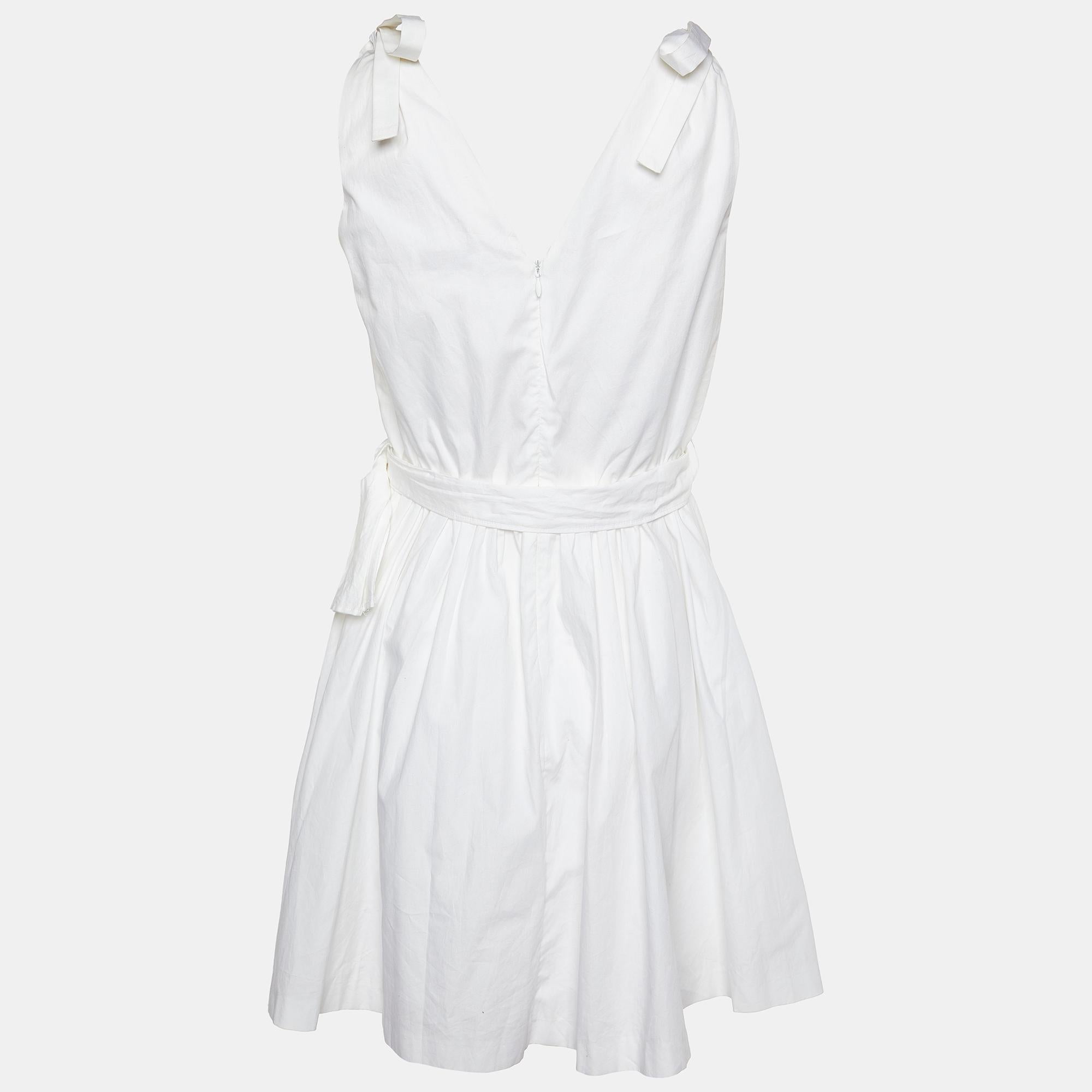 This designer dress is a chic and stylish garment that exudes elegance and sophistication. With its sleek design, flattering silhouette, and high-quality craftsmanship, this dress is perfect for any special occasion or evening event, ensuring you