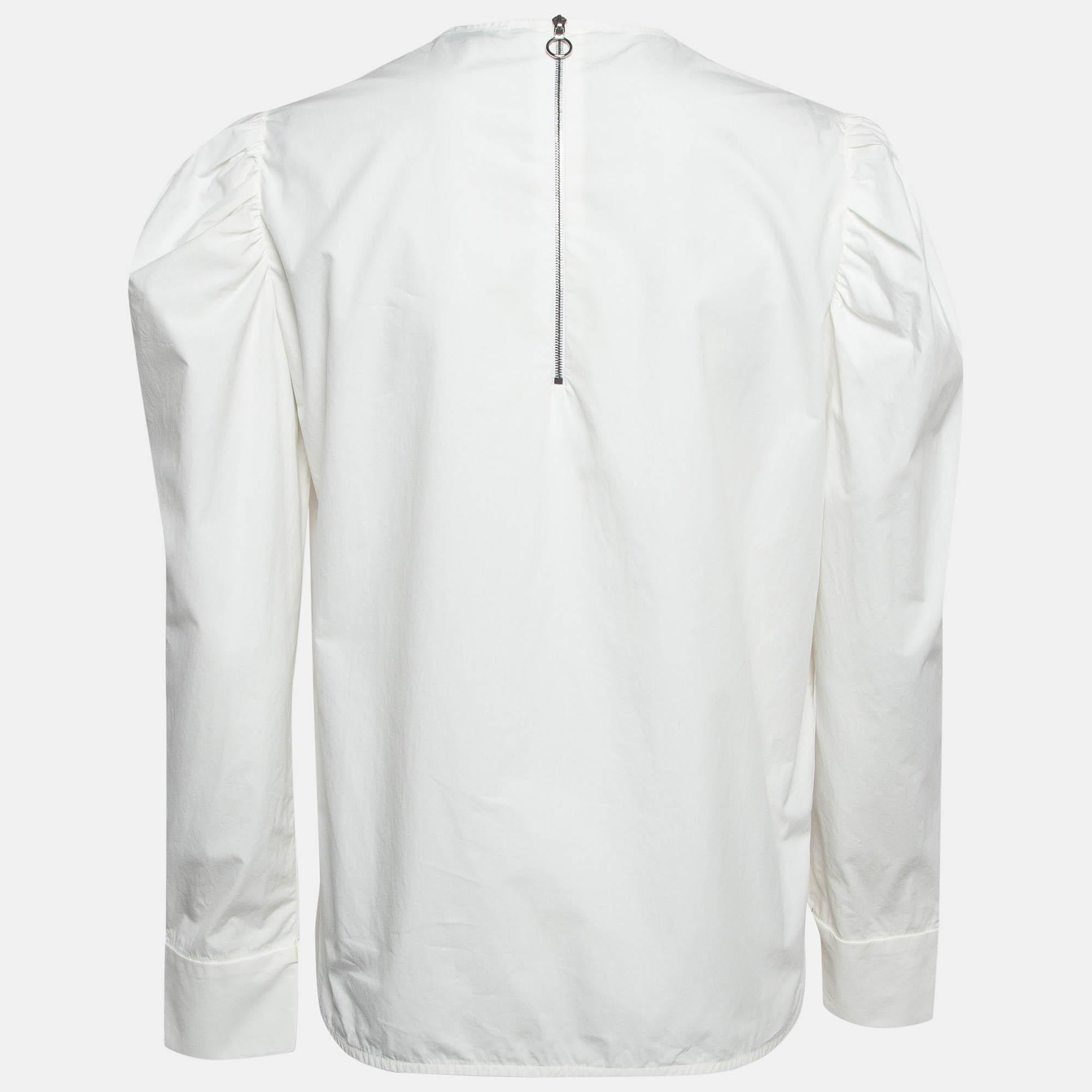 Find great style and comfort while wearing this designer top. Tailored using the best fabrics  the creation has been given immense detail. Style it with a pair of jeans and flats.