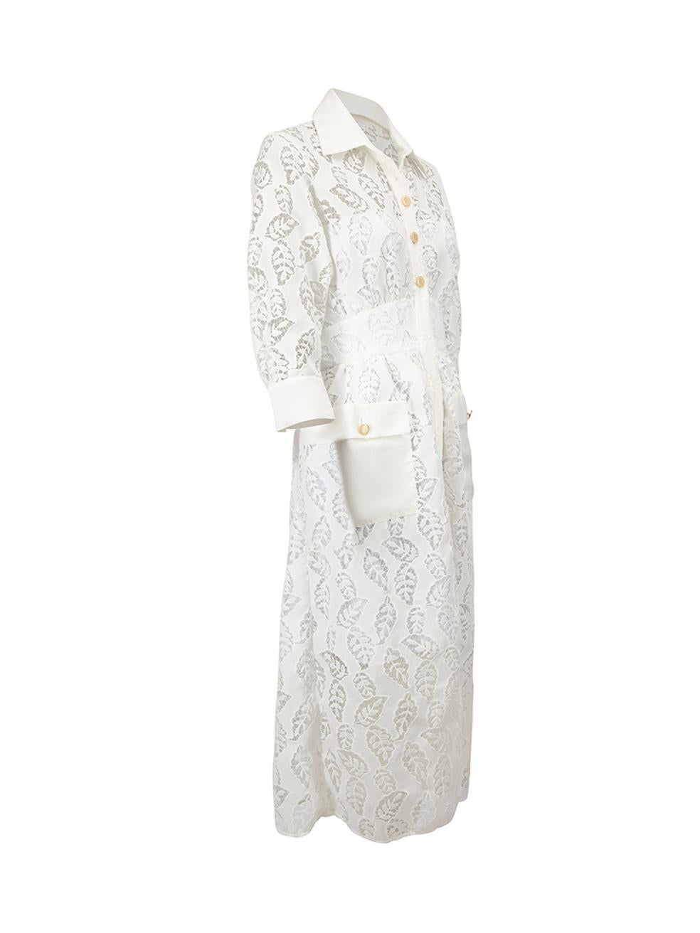 CONDITION is Very good. Minimal wear to dress is evident. Minimal wear to the neckline on this used Sandro designer resale item. 



Details


Cream

Lace

Midi dress

Leaf pattern lace

Front button up closure

3/4 length sleeves with buttoned