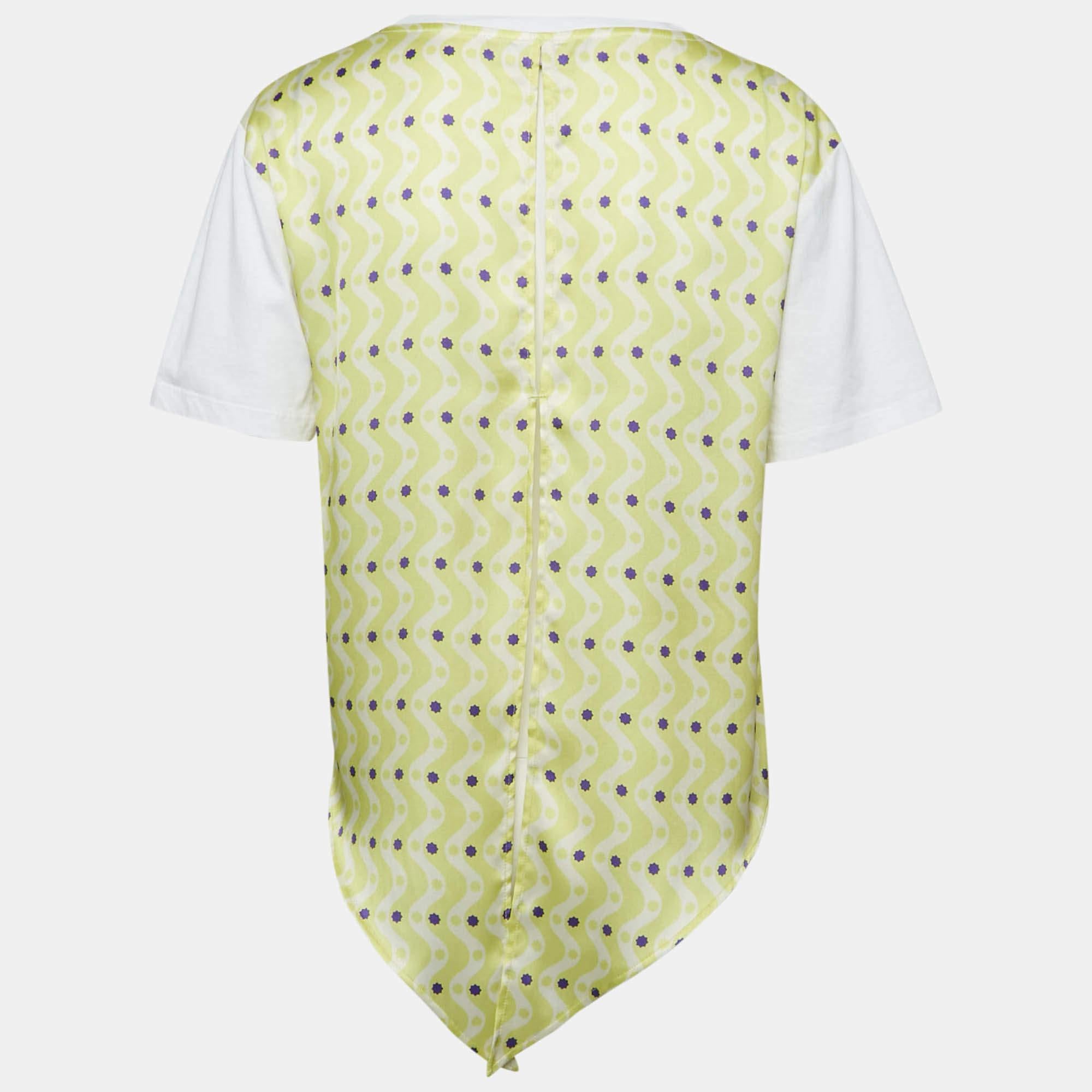 Un'accurata sartoria  materiali di qualità  e tagli eleganti fanno di questo top Sandro x Louis Barthelemy un pezzo da conservare. Il design è classico e facile da abbinare.