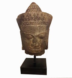 Sandstone Buddha Head Sculpture on a Stand, from Cambodia