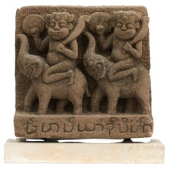 Sandstone Carving of Two Demons Riding on Elephants