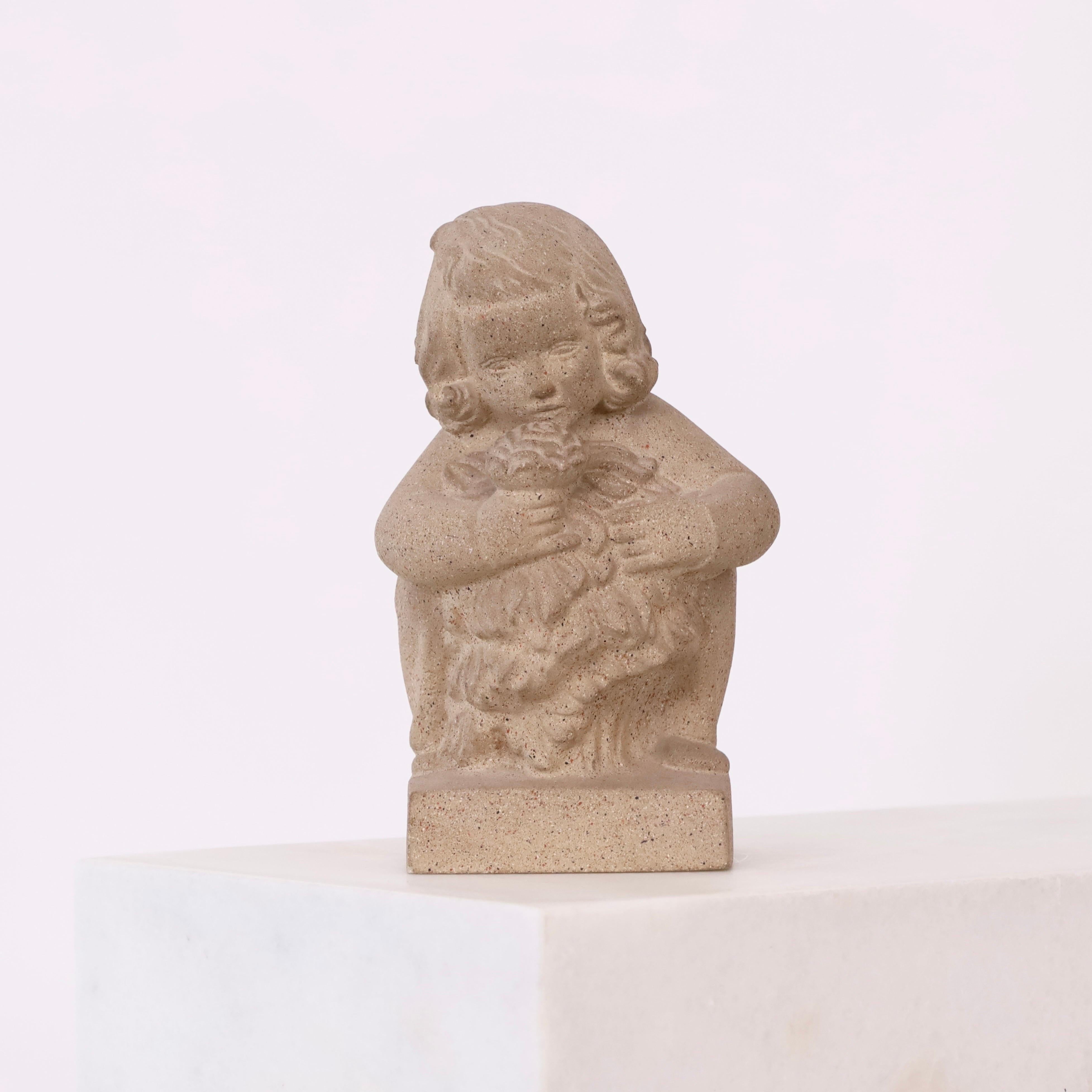 Buste naturaliste en grès conçu par le sculpteur danois Sigurd Forchhammer pour Just Andersen en 1941. 