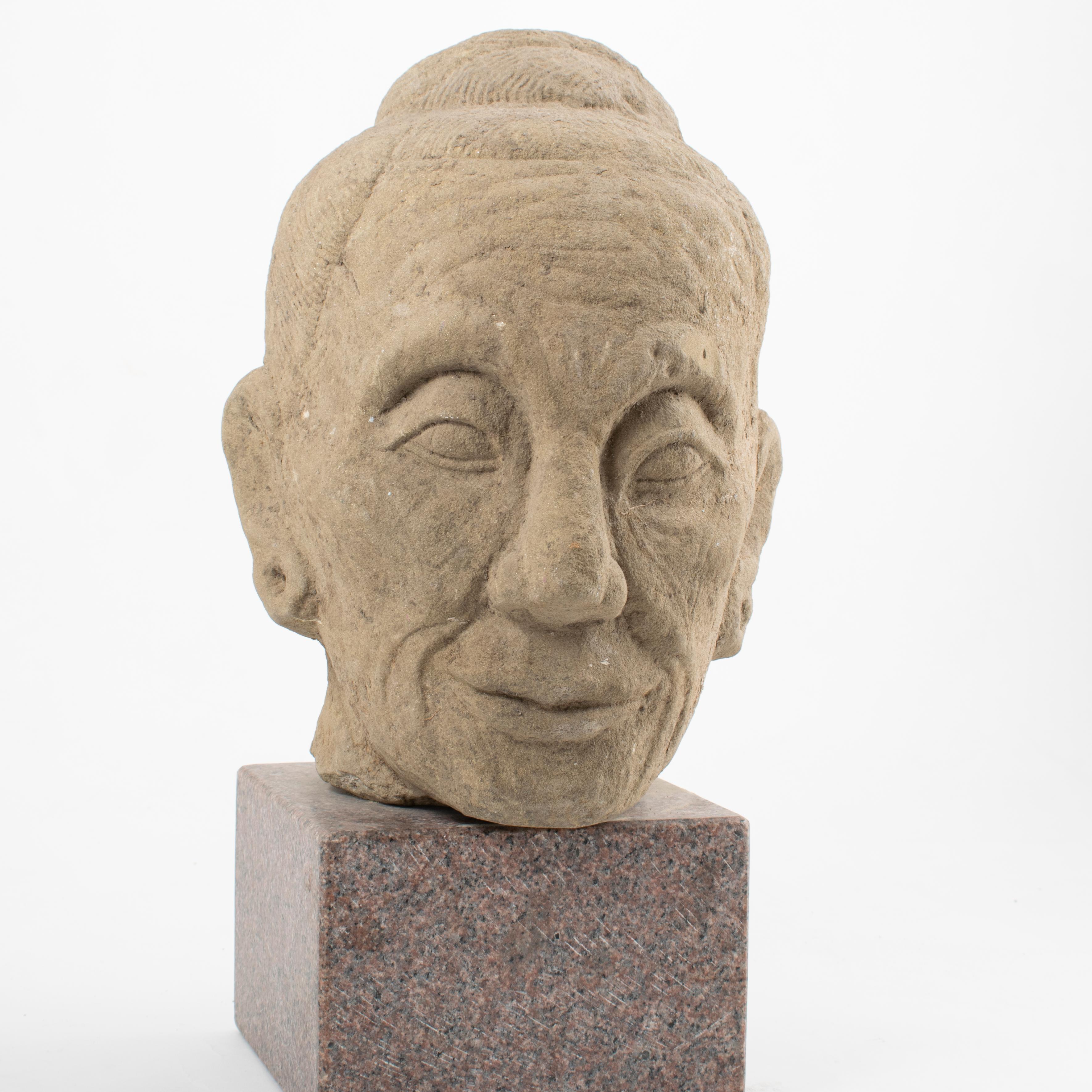 Hand-Crafted Sandstone Head of a Lohan For Sale