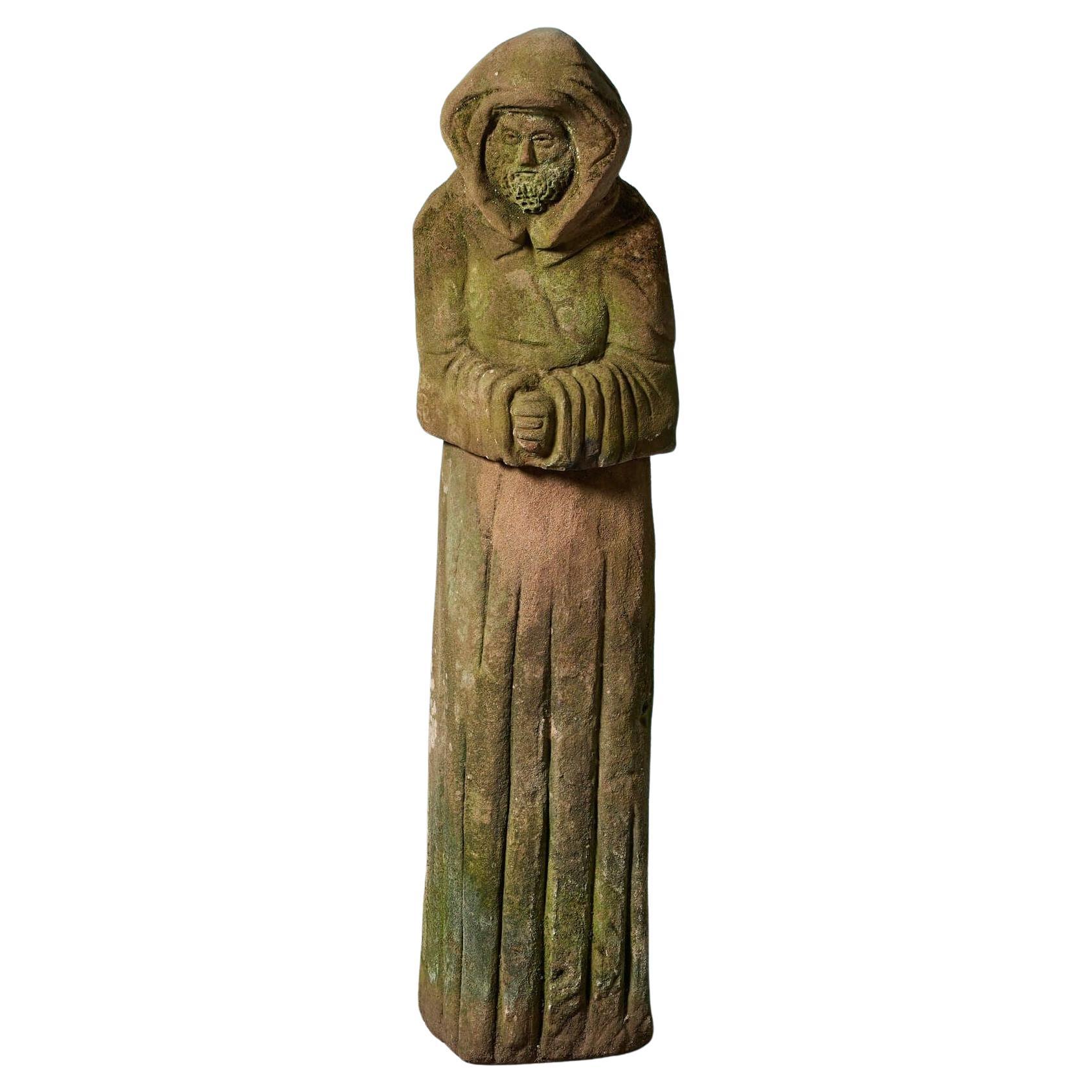 Sculpture en grès d'une figure vêtue