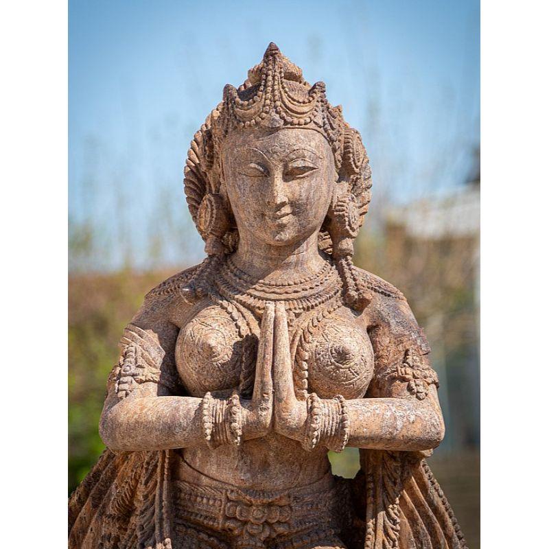 Material: Sandstone
Material: wood
124,5 cm high 
52 cm wide and 31 cm deep
Namaskara mudra
Originating from India
Late 20th century
Hand carved from a single block of sandstone
Can be shipped worldwide.
 