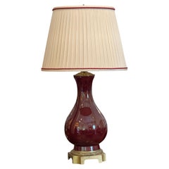 Sang de Boeuf Lampe émaillée sur socle en laiton