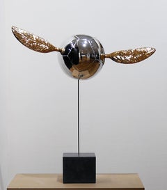 Fly to the moon, Chrome balloon with golden wings, by korean artist Sang-il Oh