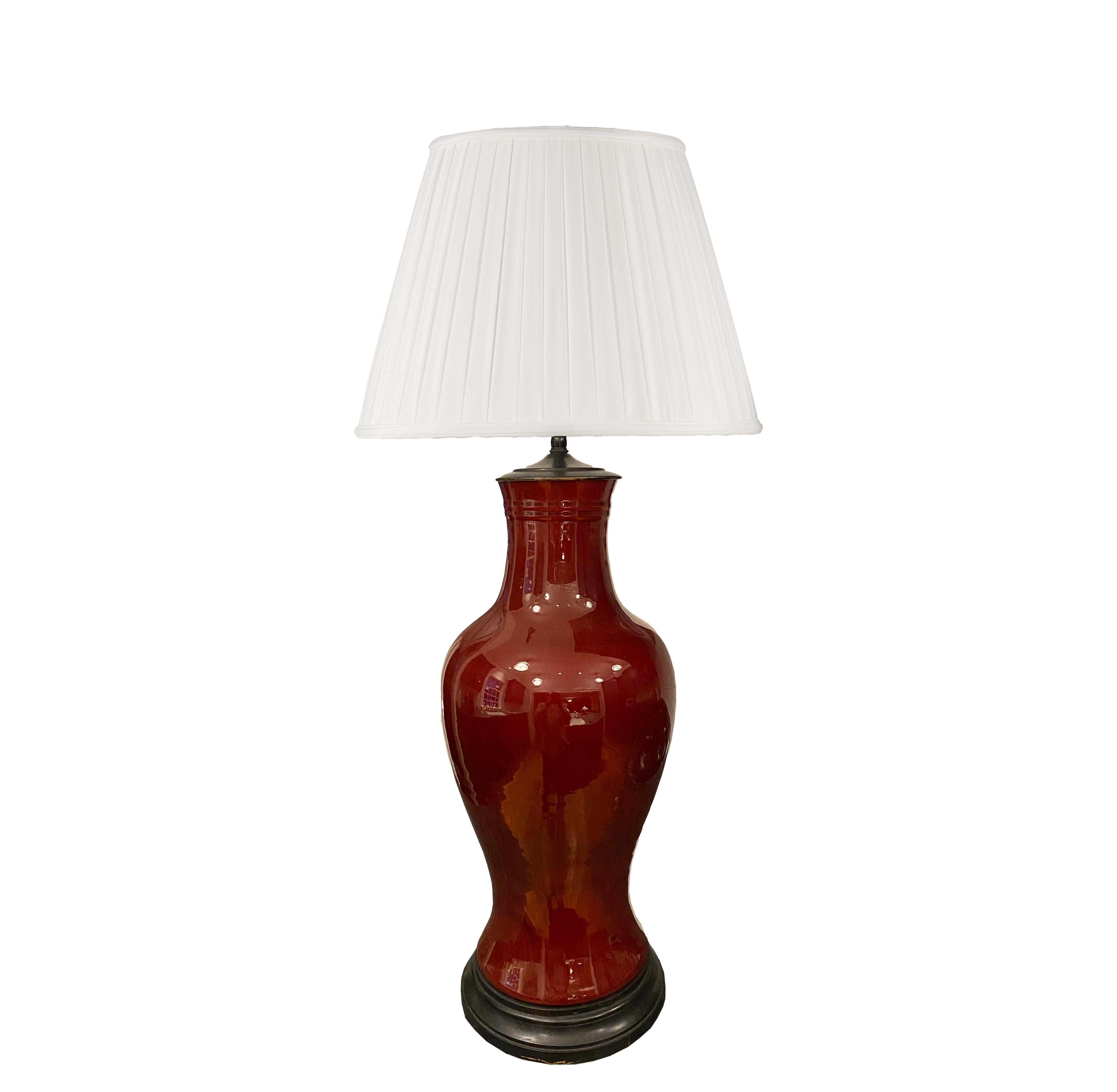 19th Century Chinese Sangre de Boeuf vase mounted as lamp with 2 Edison sockets.
