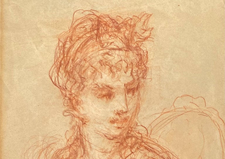 Charming red chalk study of a woman from the First Empire period, 19th century. Study of a woman in elegant costume typical of the Napoleon I period, sitting on a chair and turned 3/4 to the right. She is wearing a dress and a headband forming a