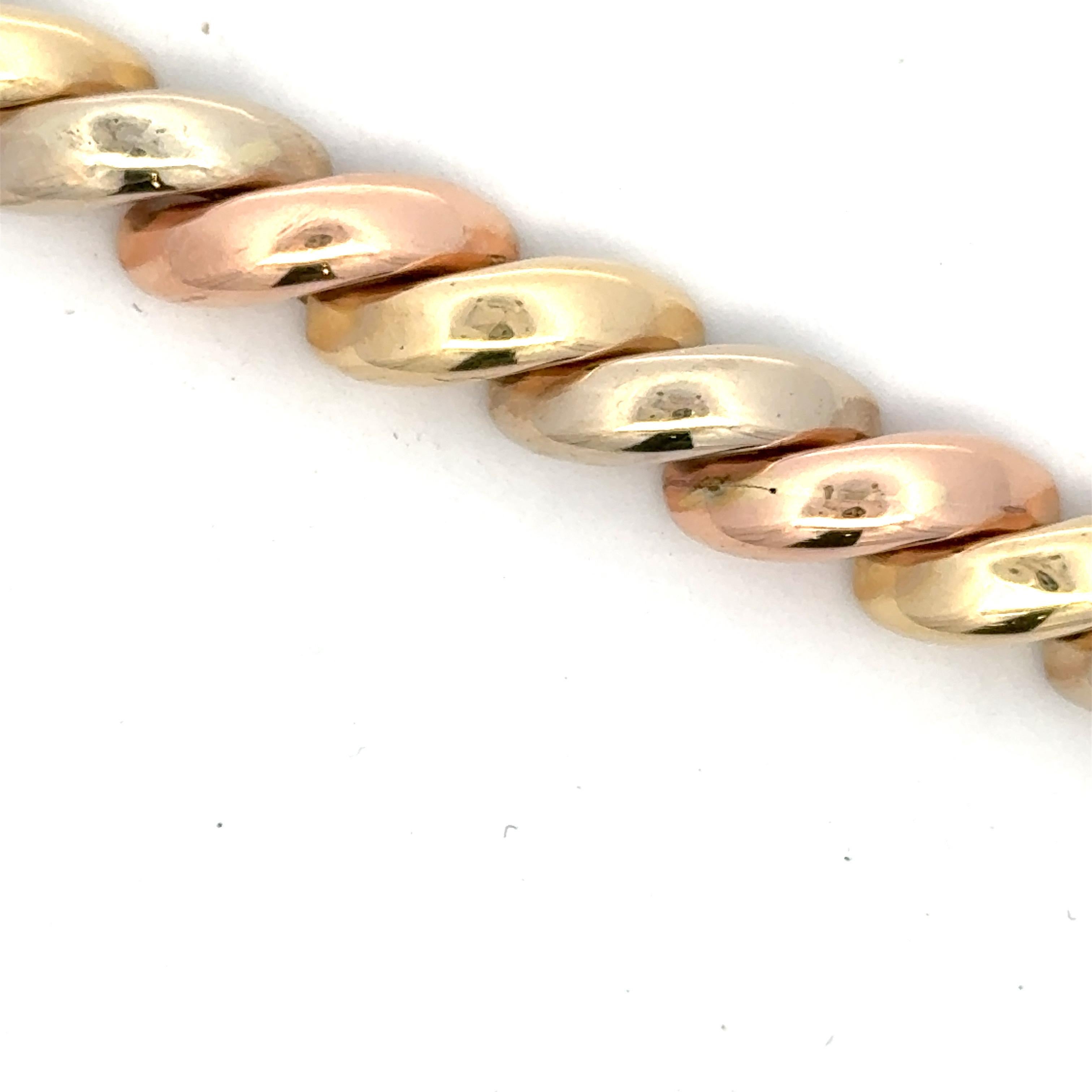 SanMarco bracelet featuring tri-color gold links weighing 22.7 grams, 14 karat gold.
Made in Italy 
