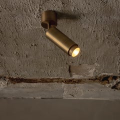 Santa 63 Surface-Mounted Spotlight Lamp in Aged Brass by Nuumbra