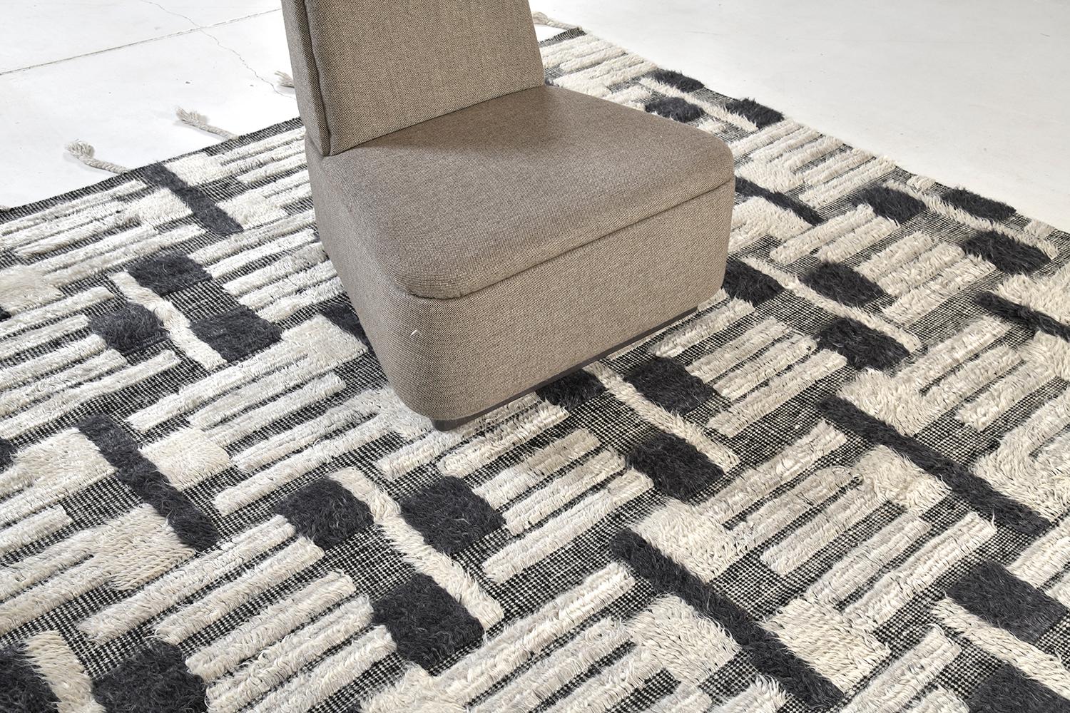 'Santa Ana' is handwoven of ivory and deep ocean blue shag amongst a black and white flat-weave. Designed in Los Angeles with immense detail, Santa Ana brings comfort into your home and is designed to be lived on.


Rug number: 28717
Size: 8' 0
