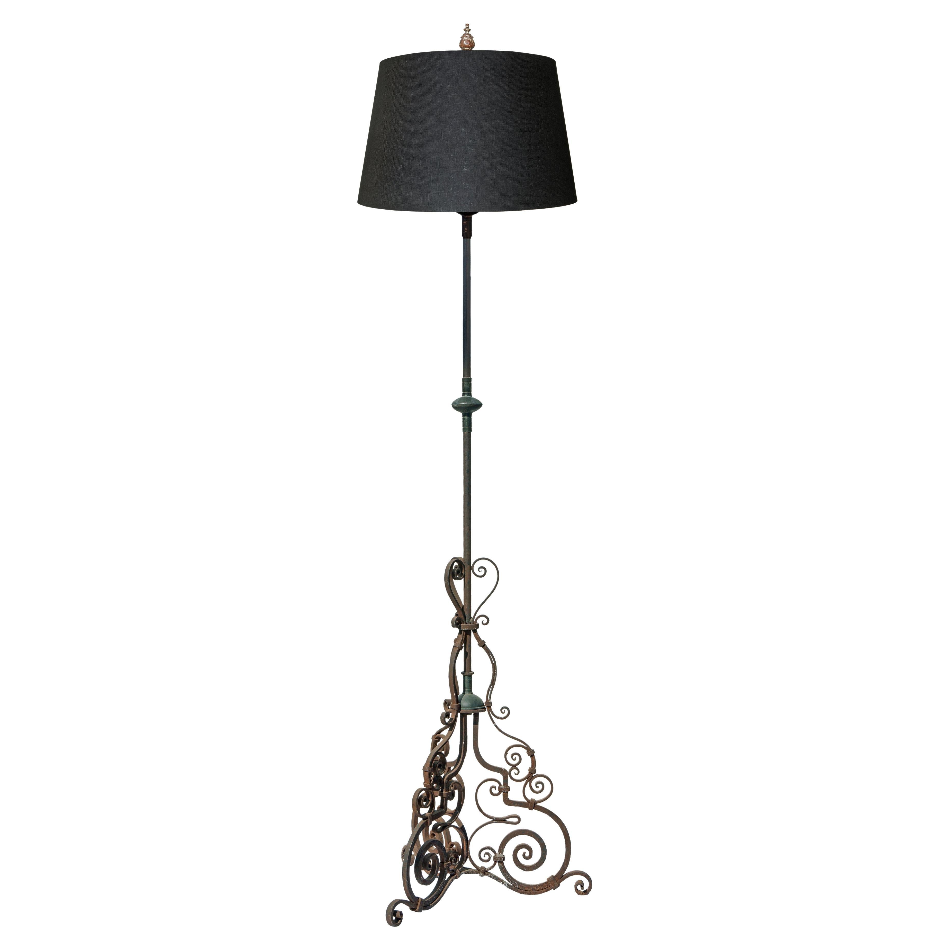 Original Santa Barbara Mission hand wrought iron floor lamp converted from floor candlestick. This rare piece is inspired by a natural rustic aesthetic. Newly wired, with pull chain, new cord & plug. Standard bulb recommended.
Ivory hardback shades