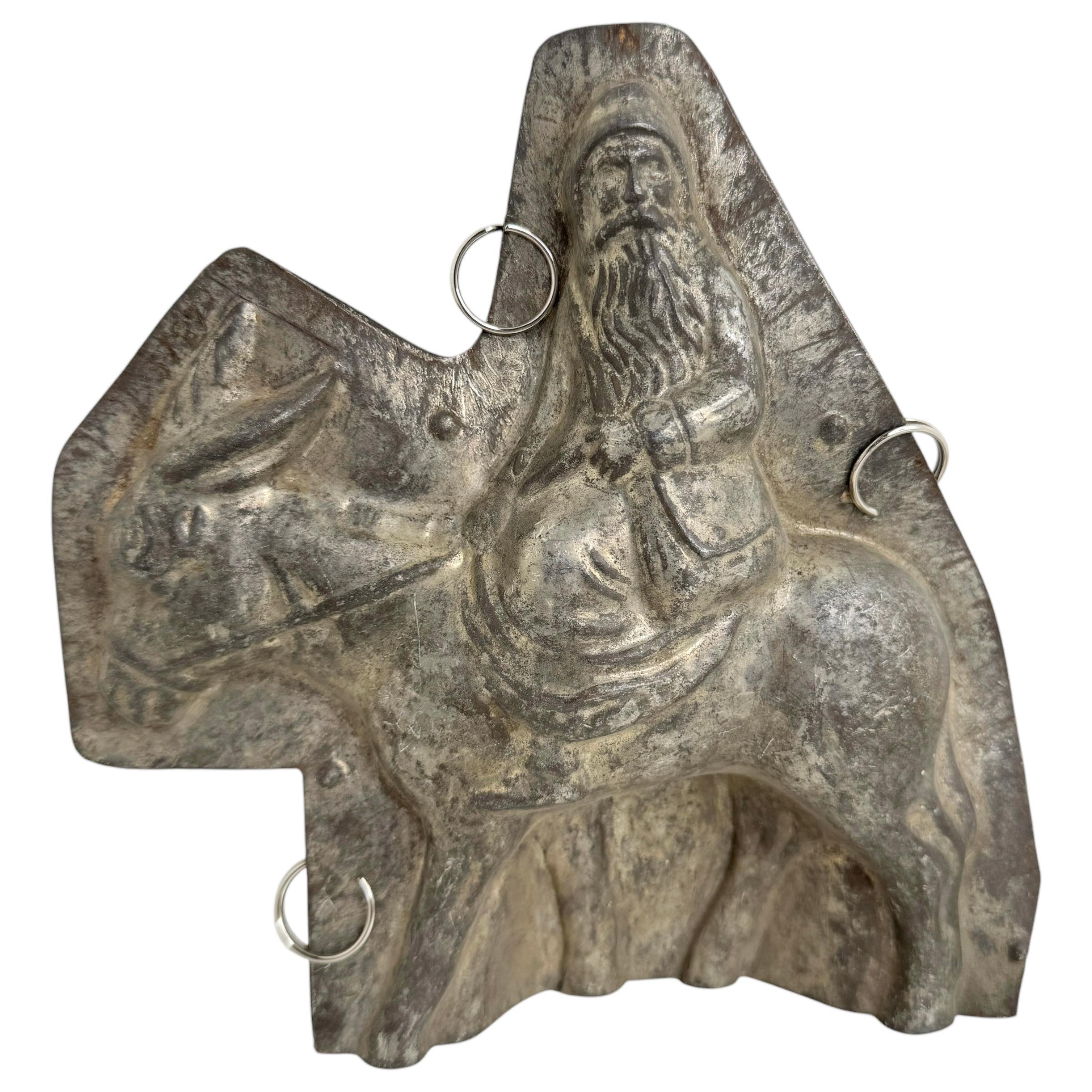 A gorgeous chocolate mold. Made of metal, not marked. Beautiful and ready to use or display, with nice patina. The 1890s to 1920s were the golden age of Chocolate production and consumption throughout Europe. Many cities and towns had competing