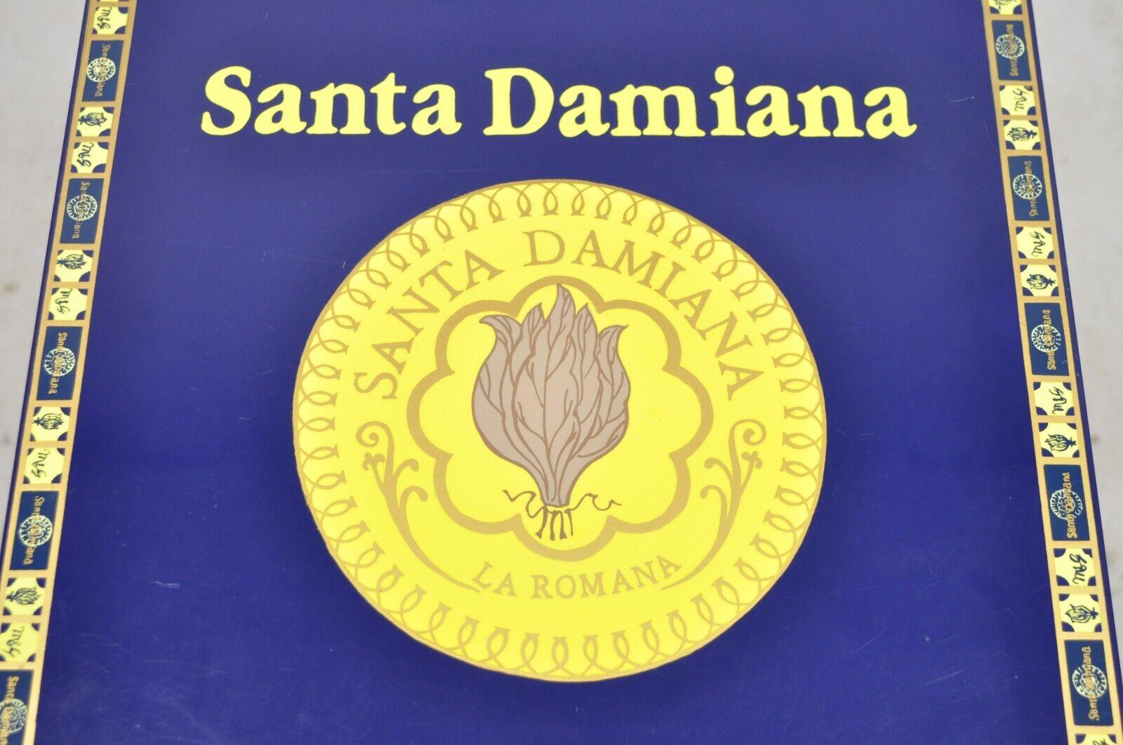 Boîte à cigares Santa Damiana La Romana en bois laqué bleu. L'article présenté est un très bel article d'occasion. Vers le début du 21e siècle. Dimensions : 3,25