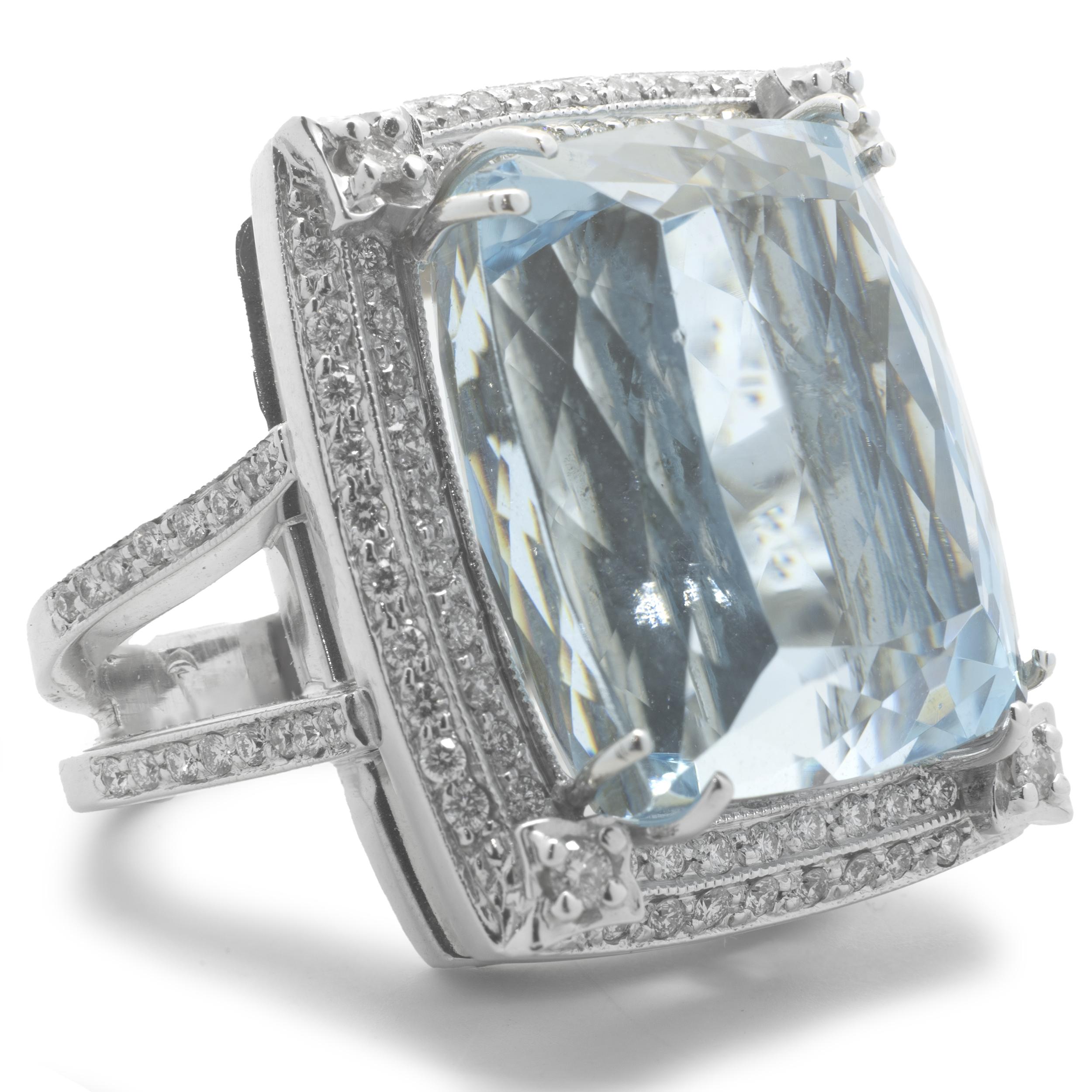 Designer: custom design
Material: 14k white gold
Aquamarine: 100% natural cushion cut 32.00 carat weight aquamarine mined from Santa Maria, Brazil
Diamonds: 1.00 carat total weight
Dimensions: ring top is 25.40mm long and 22.51mm wide
Ring Size: 7 ½