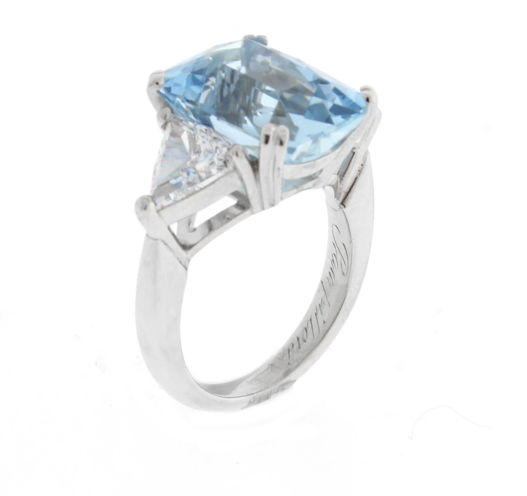 From the master ring makers at Pampillonia jewelers an aquamarine and diamonds ring.  The  handmade platinum ring features a gem santa maria aquamarine weighing 6.89 carats and two colorless ( D-E VVS)  trilliant cut diamond weighing 1.65 carats. 