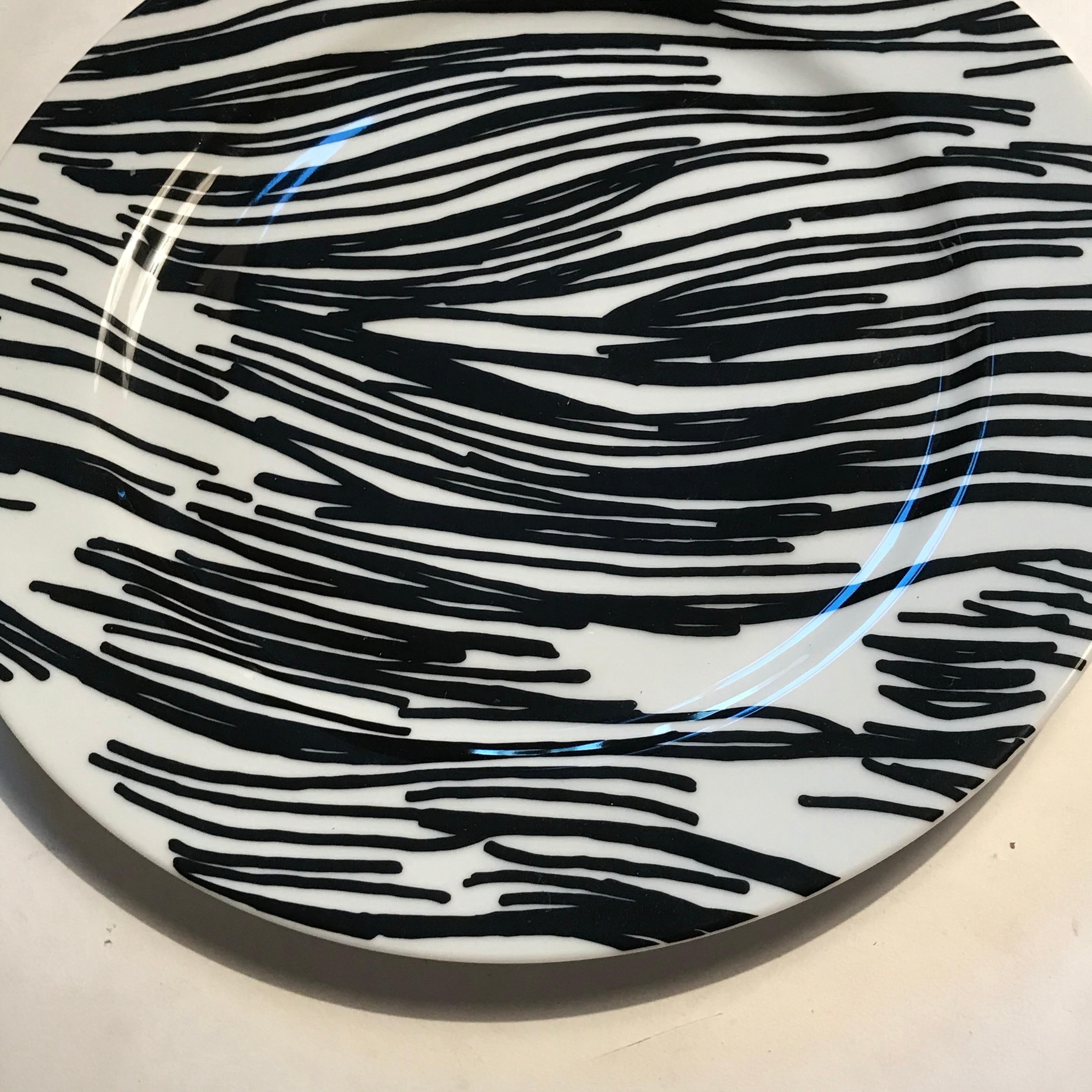 Ceramic plate designed by artist Mark Bradford. Produced on the occasion of the Santa Monica Museum of Art’s 20th anniversary. Edition of 125 Plate signed; numbered and stamped with artist signature and SMMOA 20th anniversary stamp to the verso.