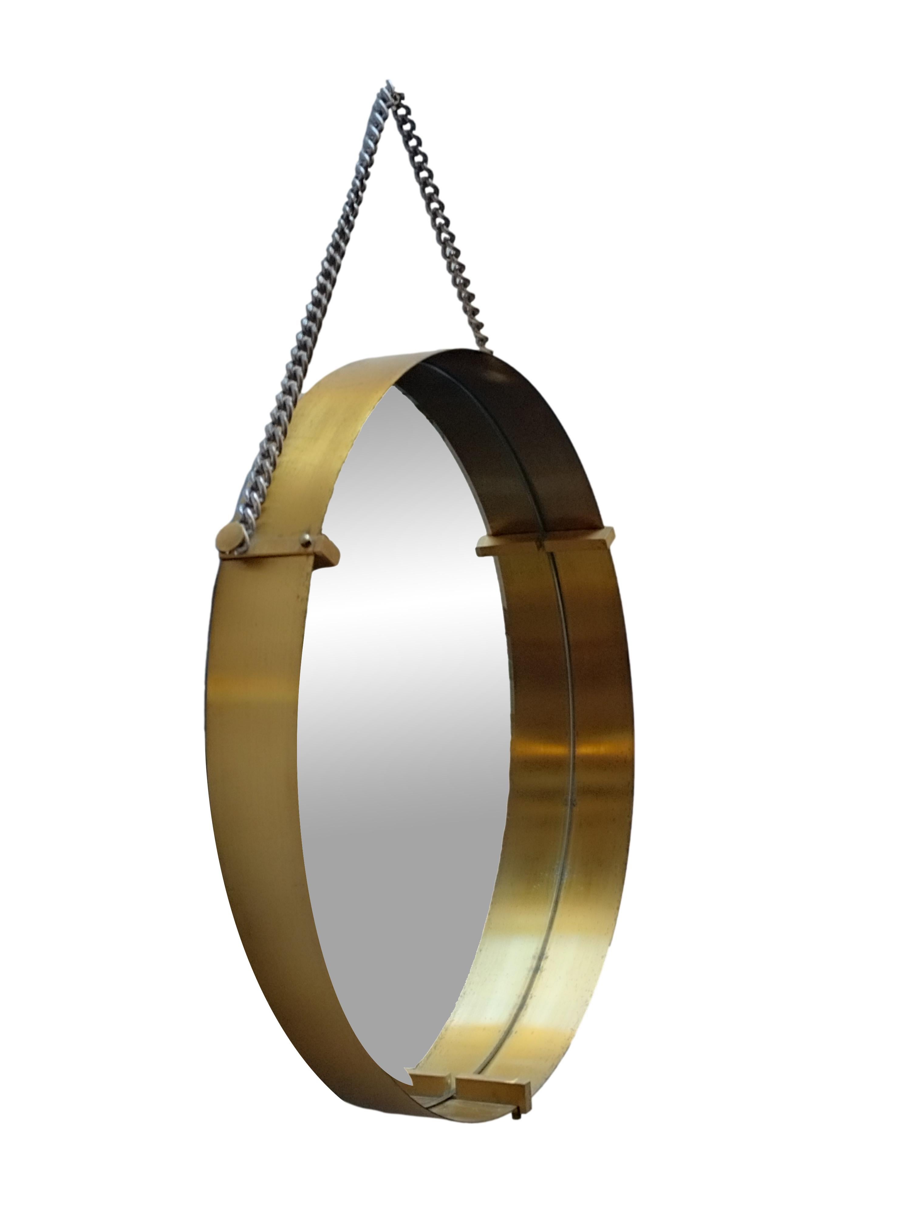Wall mirror by Santambrogio & De Berti, 1960s Italian design,
The mirror has solid brass details and is supported by a chain.