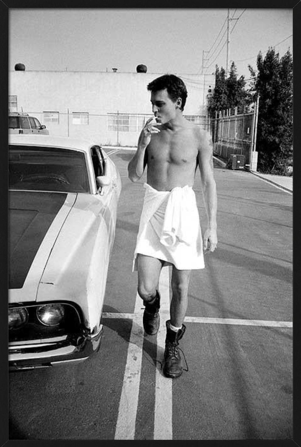 Johnny Depp, Hollywood, CA - the actor in a towel and cigarette beside a car - Contemporary Photograph by Sante D´ Orazio