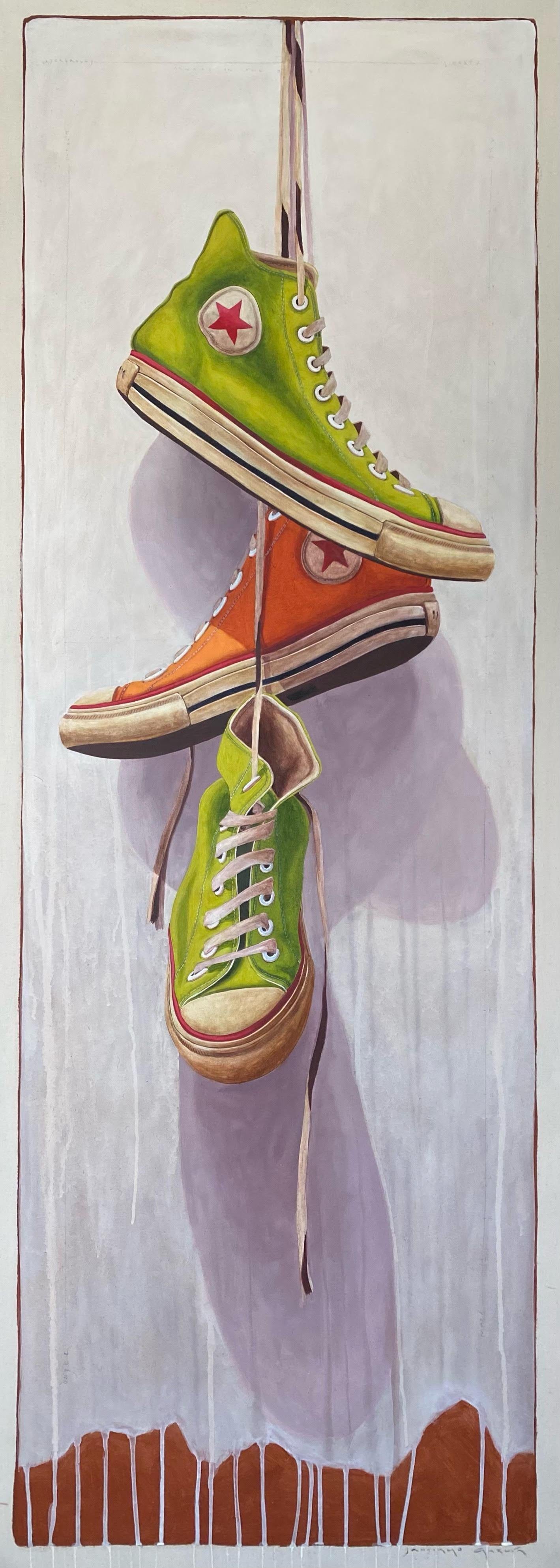 Santiago Garcia Figurative Painting - "#1411" oil painting of green & orange converse sneakers hanging by their laces