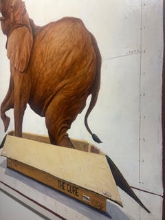 "#1584" playful elephant in a box with head raised, rose emerging from its trunk