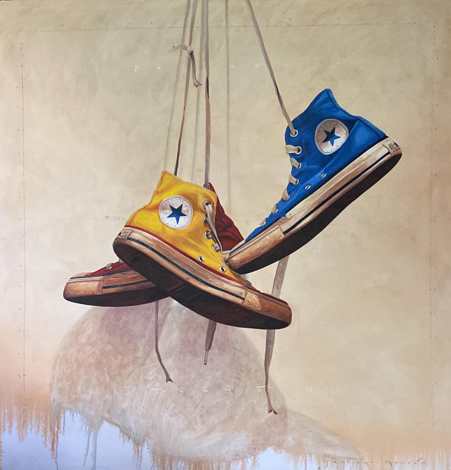 Still-Life Painting di Santiago Garcia - Le converse "#1597" blu, rosse e gialle pendono dall'alto