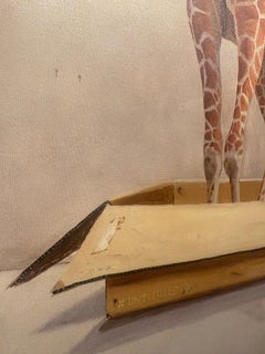 « n°1618 », un jeune girafe se tient dans une boîte en carton étiquetée pour Martha's
