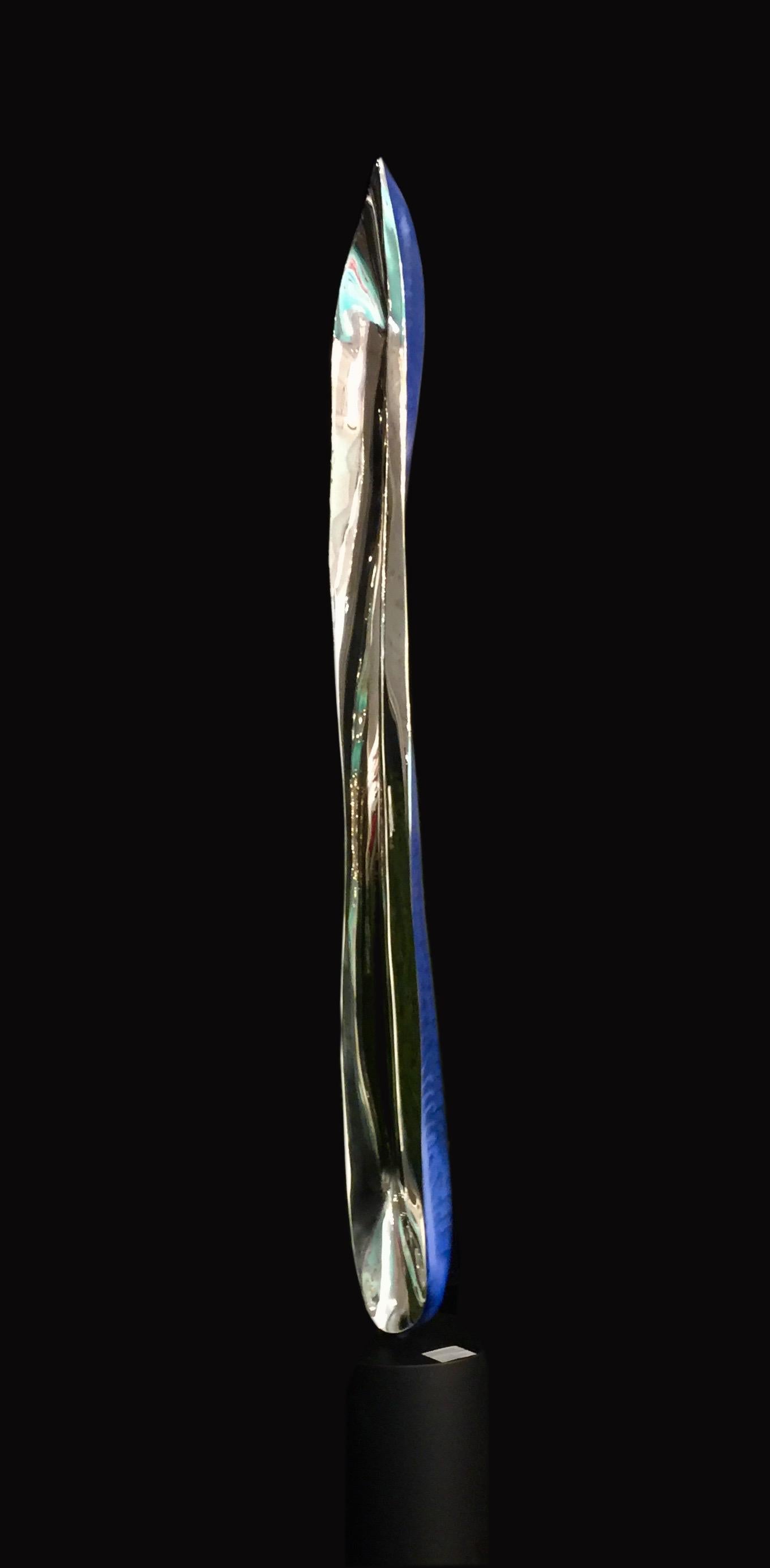 Italian stainless steel with a blue tint.

This sculpture will be shipped directly from the artist's studio.