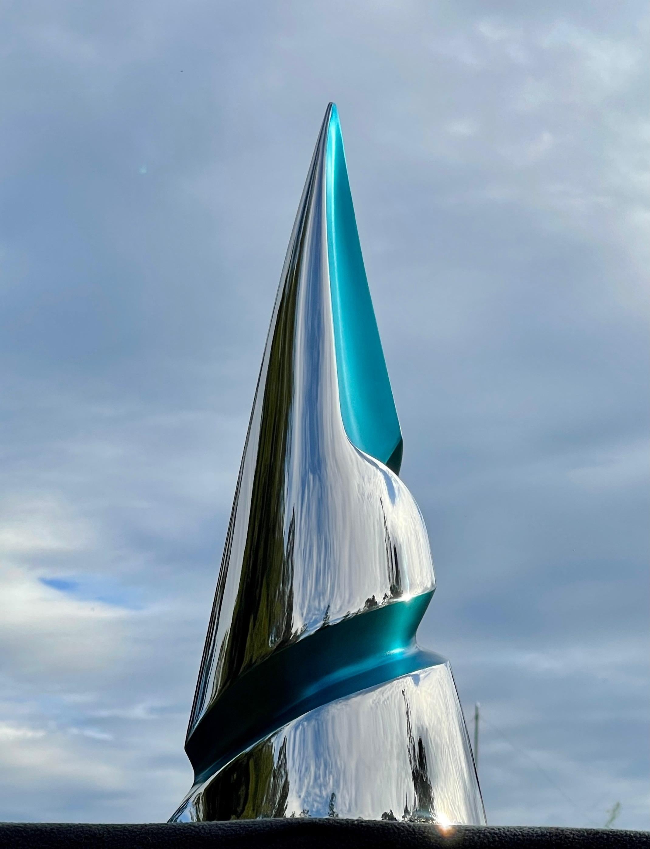 Marine outdoor Italian stainless steel with turquoise tint.

Sculptor Santiago Medina Italian stainless steel sculptures are at marquee public art venues worldwide such as Harvard, Stanford University, City of Miami-Pinecrest Circle, Tufts,