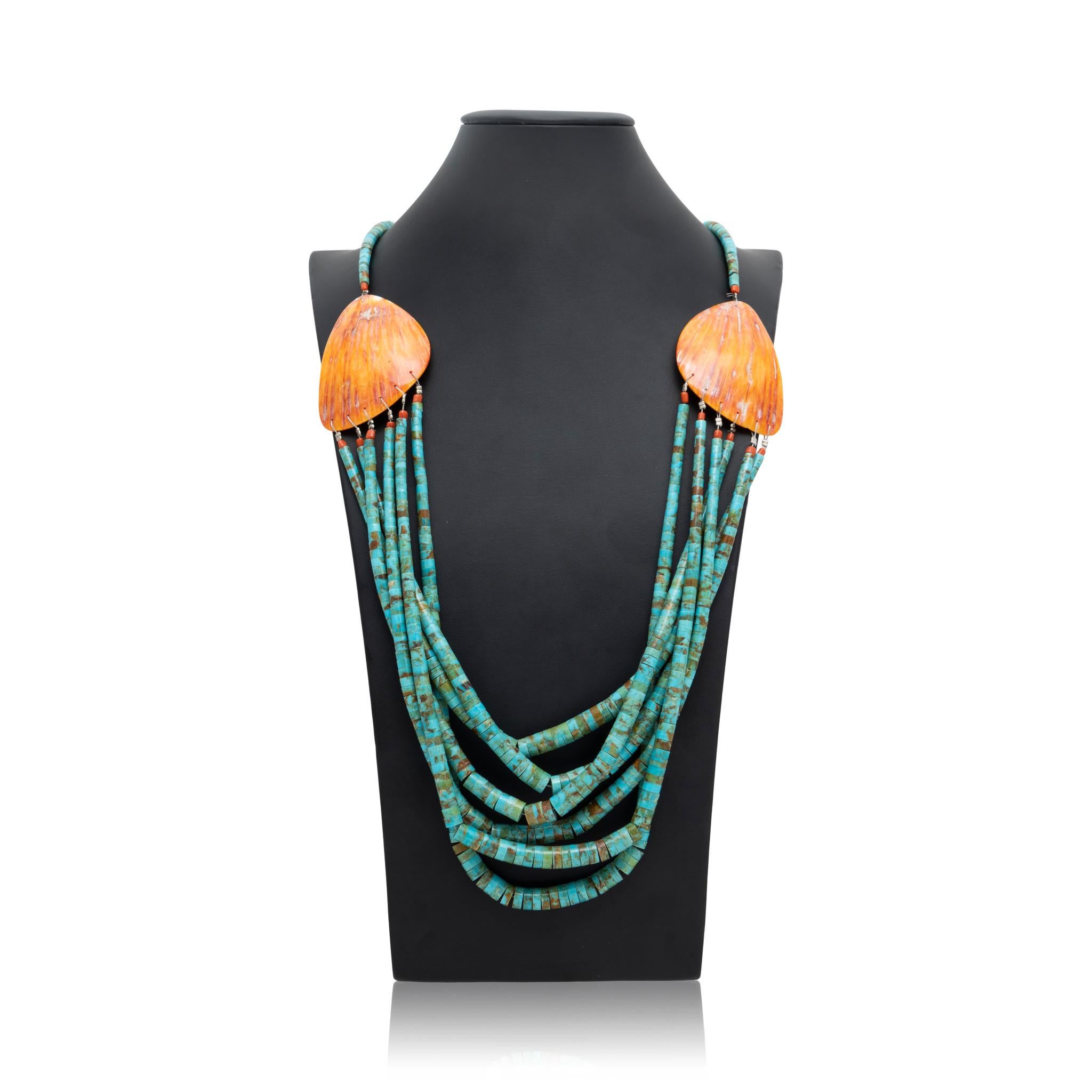 Santo Domingo spiny oyster and natural Kingman turquoise Heishi necklace. Having five strands with coral beaded ends and graduated stones, sterling silver ties and two large spiny oyster shells near center. Multi-strand lower half attaches to