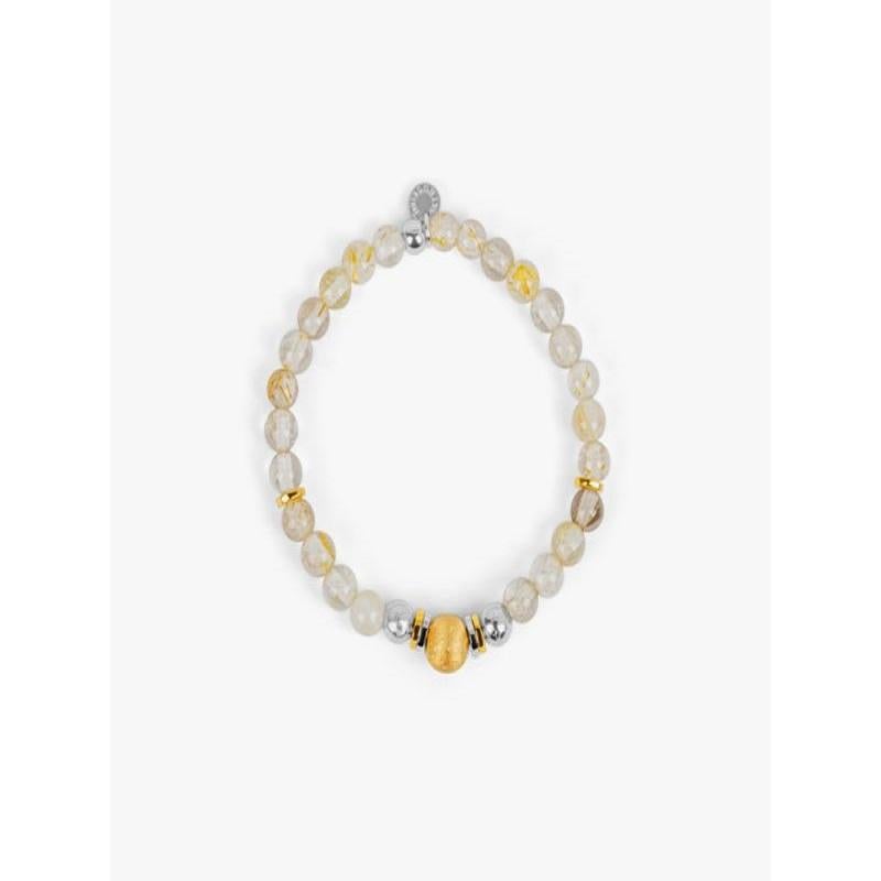 Santorini bracelet in gold rutilated quartz and gold plated sterling silver

Sterling silver beads have been delicately and expertly hammered to add a sparkling effect to the beads. A combination of plating combines colours, complimented by the