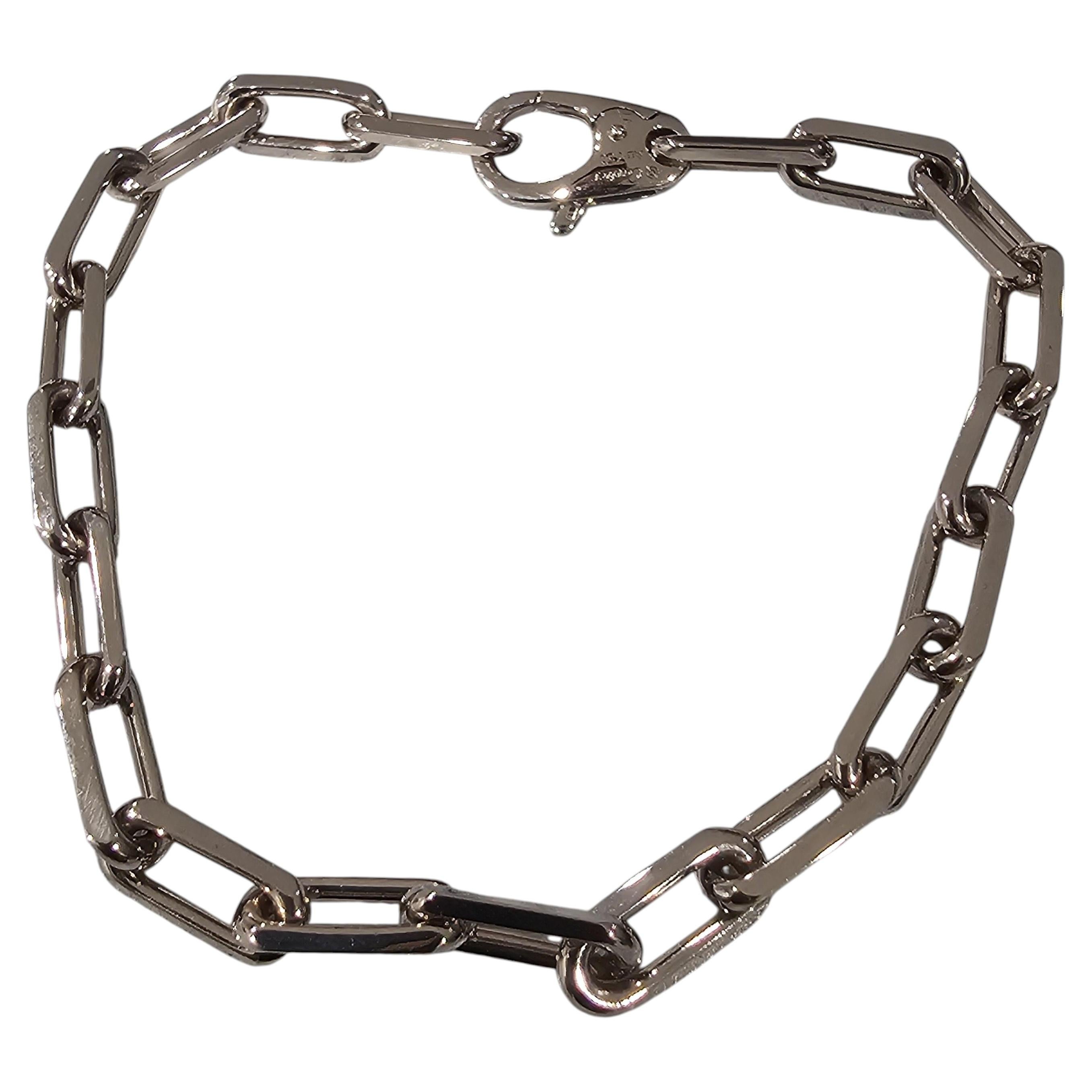 How do ! remove the Cartier Santos bracelet?
