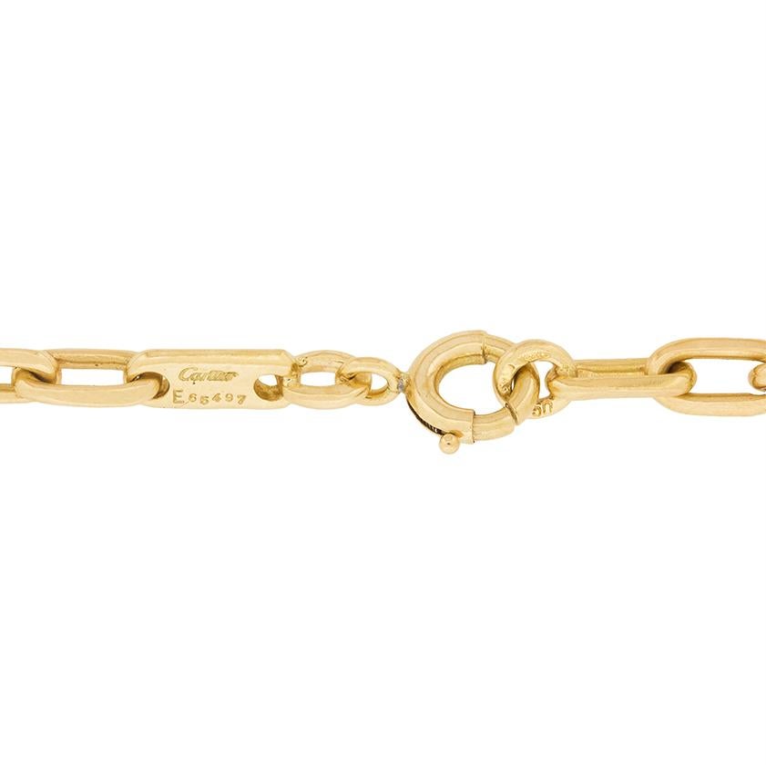 Weighing 20.2 grams, this necklace is made from 18 carat yellow gold and is from the Santos De Cartier collection. It has the original makers mark on the chain and is a linked design. It is plain gold and is 16 inches in length, which is the small