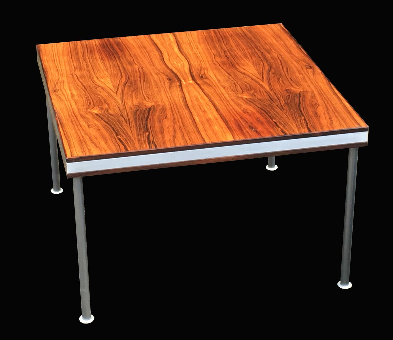 A very nice coffee table, sometimes by Poul Cadovious, the nicely figured Santos Rosewood ( a species which does not require CITES certification) with aluminium edges and legs. A very nice example in great condition and with an especially nice color
